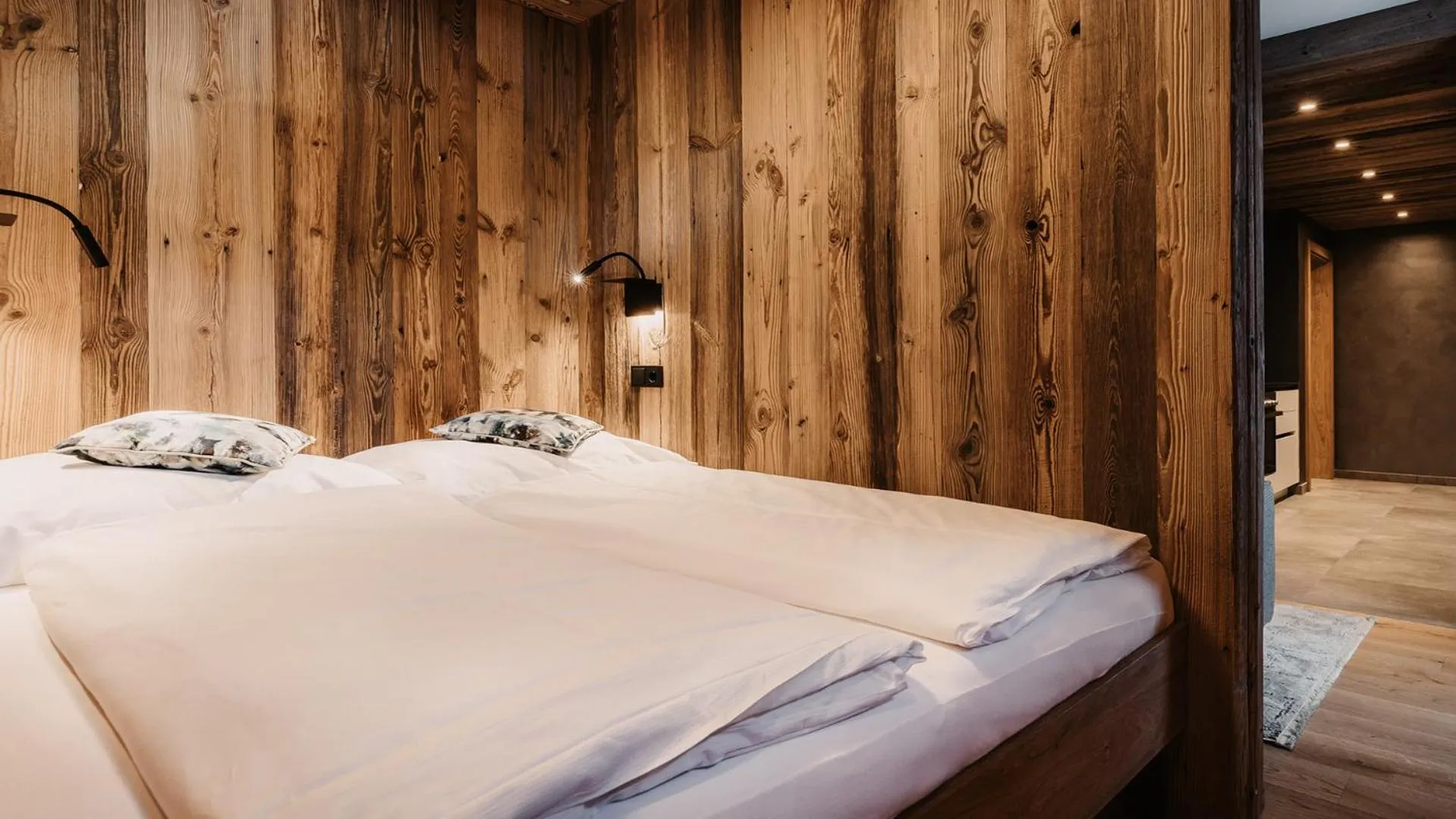 Bed in Hofgut Apartment & Lifestyle Resort Wagrain