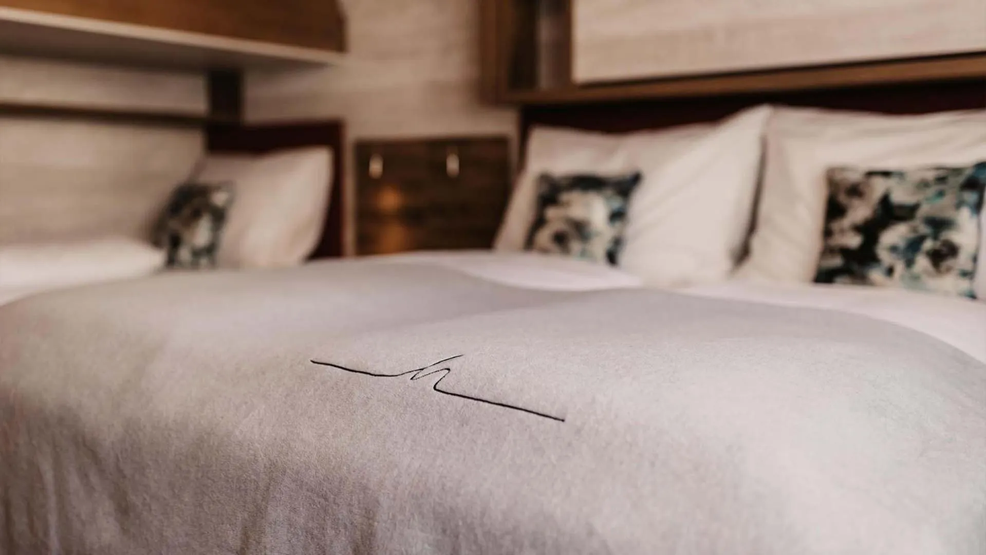 Bed in Hofgut Apartment & Lifestyle Resort Wagrain