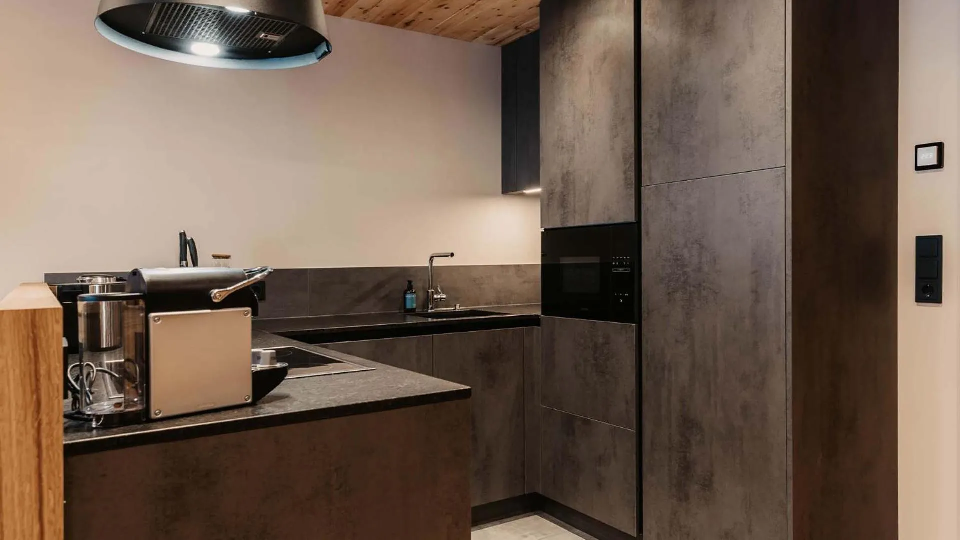 Kitchen or kitchenette in Hofgut Apartment & Lifestyle Resort Wagrain