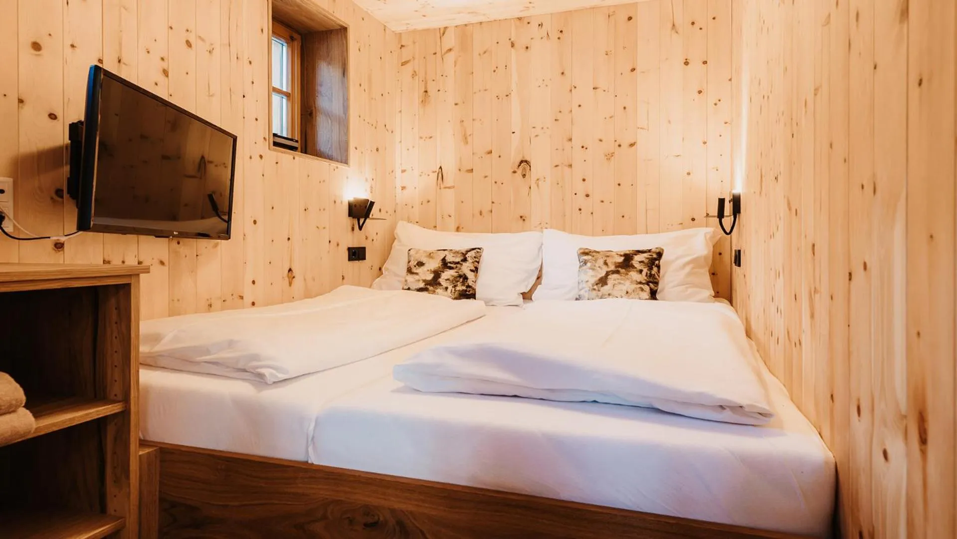 Bed in Hofgut Apartment & Lifestyle Resort Wagrain