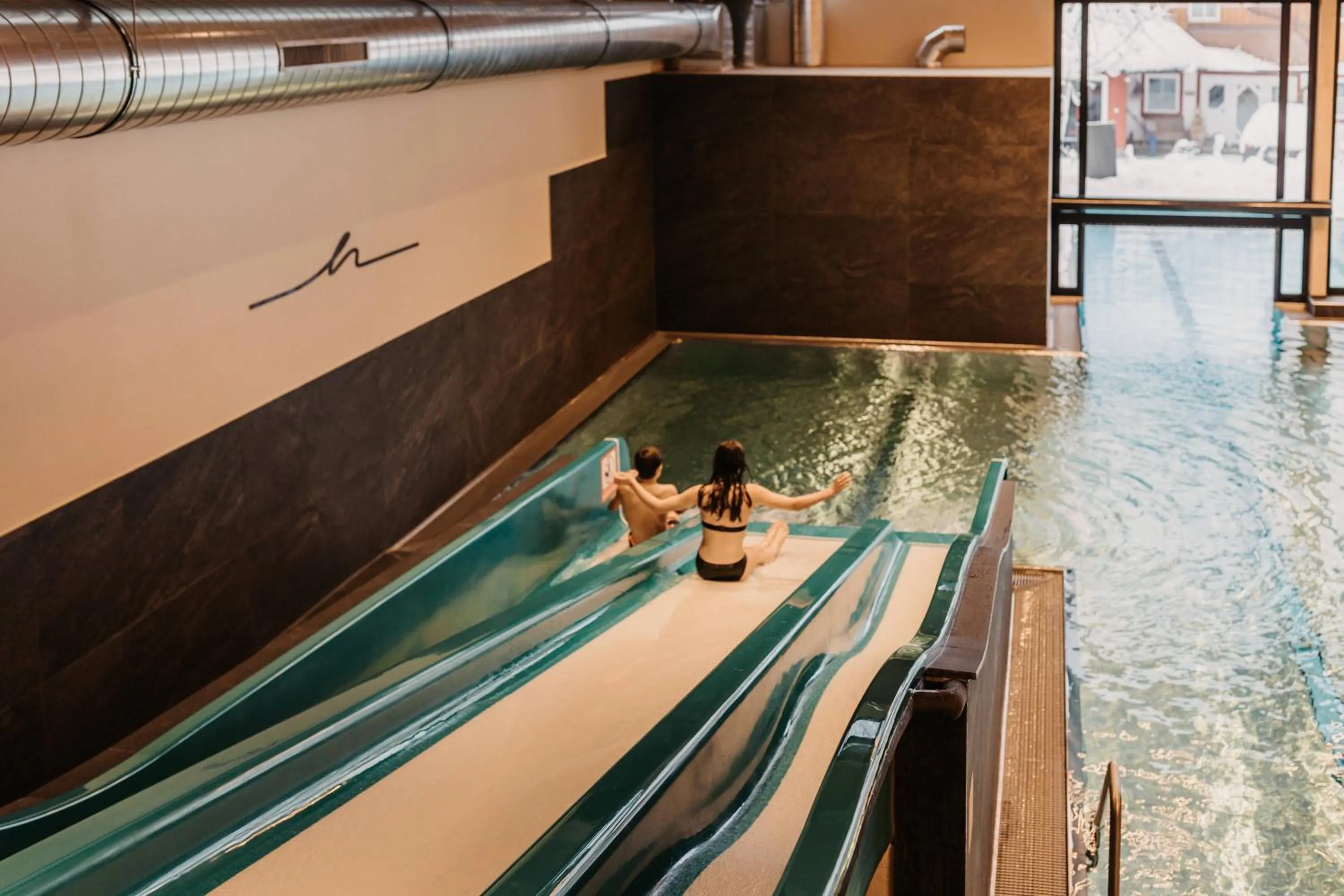 Swimming pool in Hofgut Apartment & Lifestyle Resort Wagrain