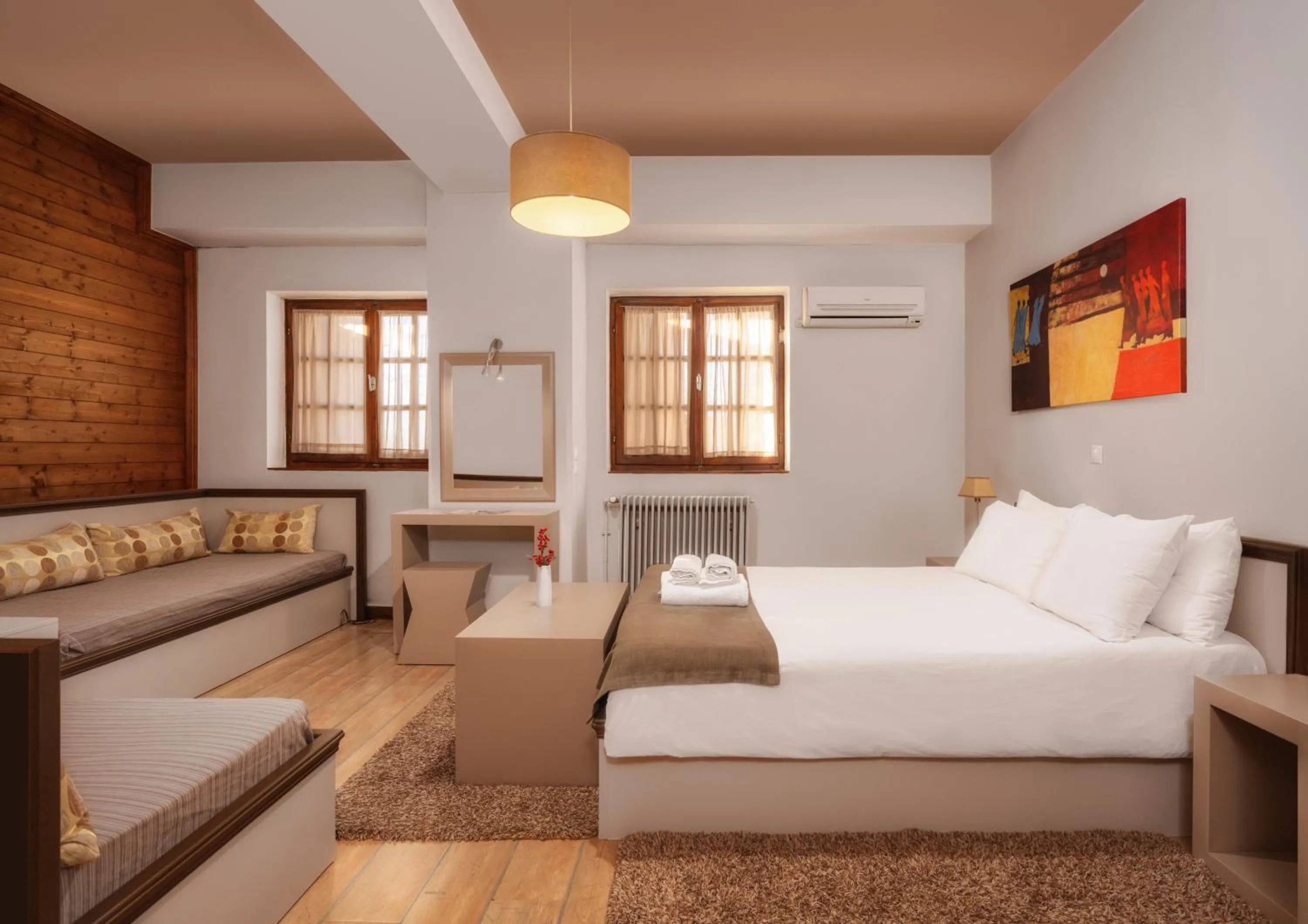 Bed in Κonitsa Gefyri hotel