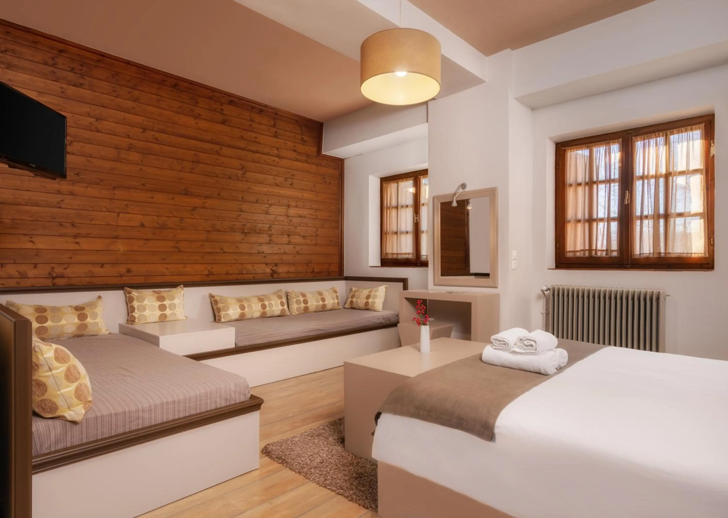 Bed in Κonitsa Gefyri hotel