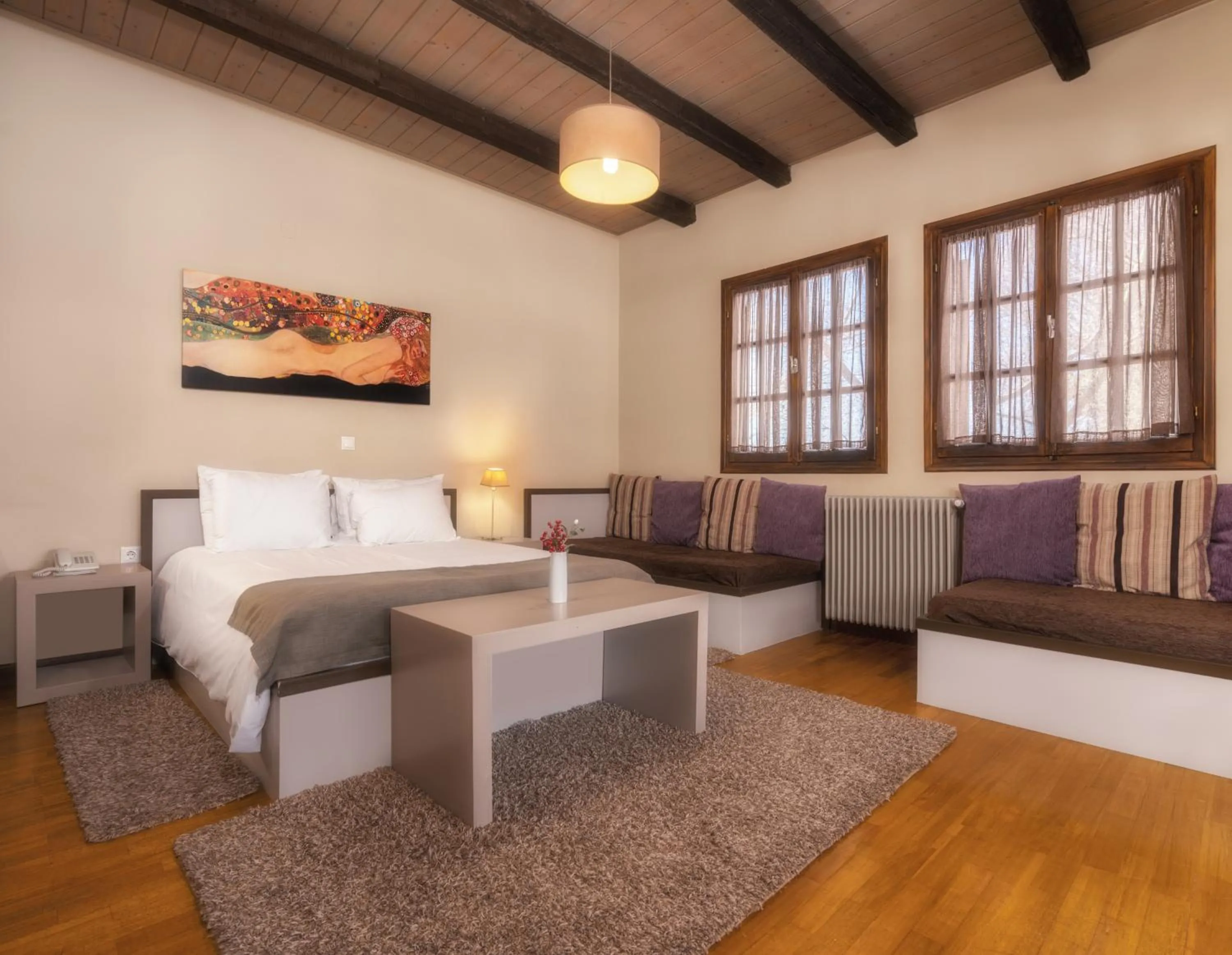 Bed in Κonitsa Gefyri hotel