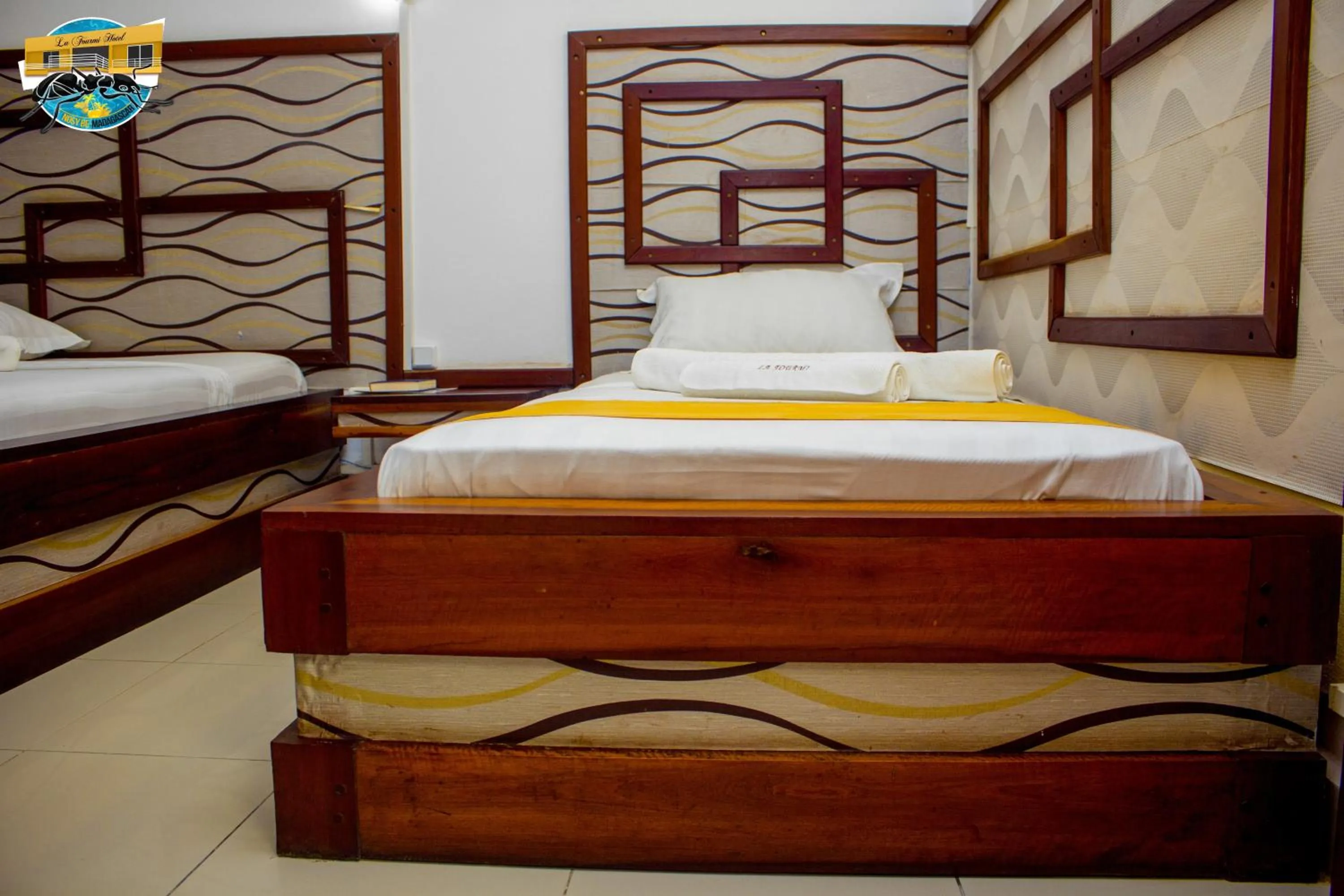 Bed in La Fourmi Hotel