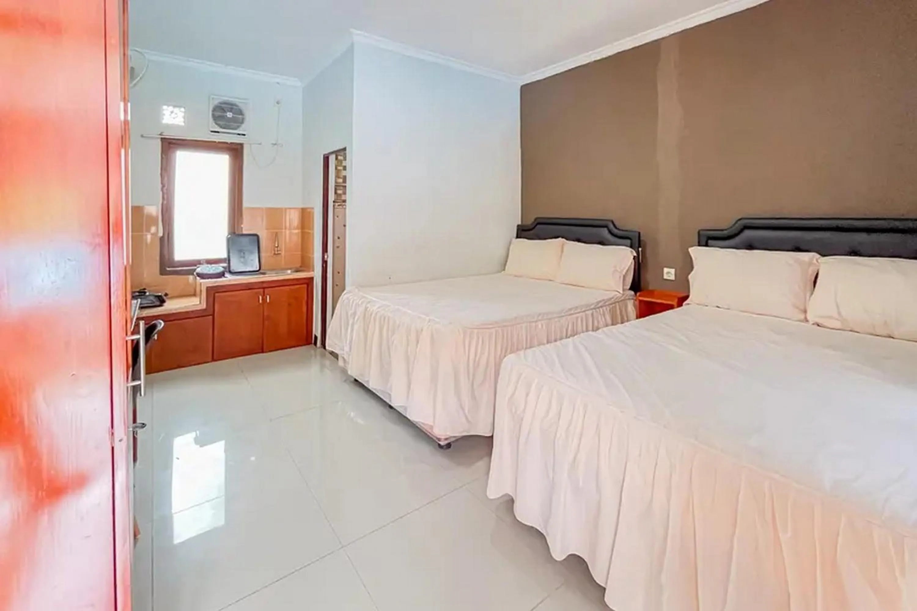 Bed in Villa Kampoeng City Wonosalam Mitra RedDoorz