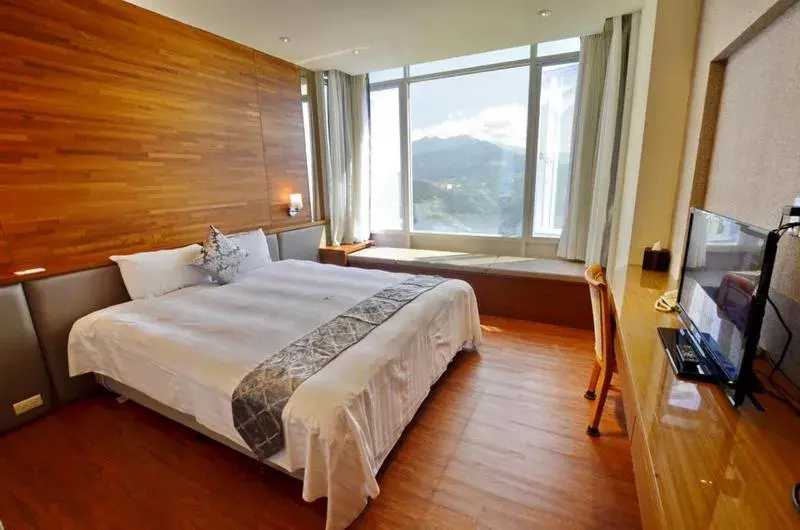 Bed in Jun Yue Hanging Garden Resort Bed in Jun Yue Hanging Garden Resort