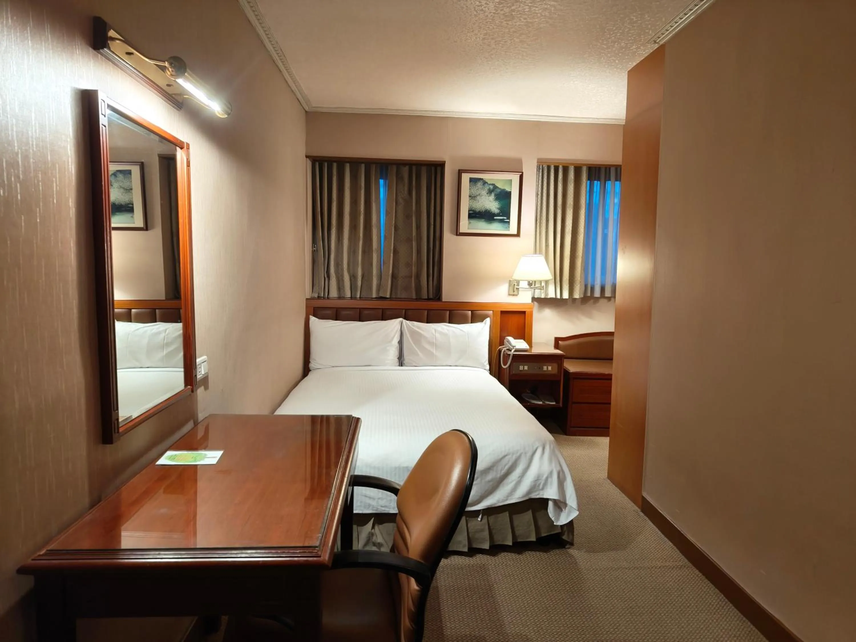 Photo of the whole room, Bed in First Hotel