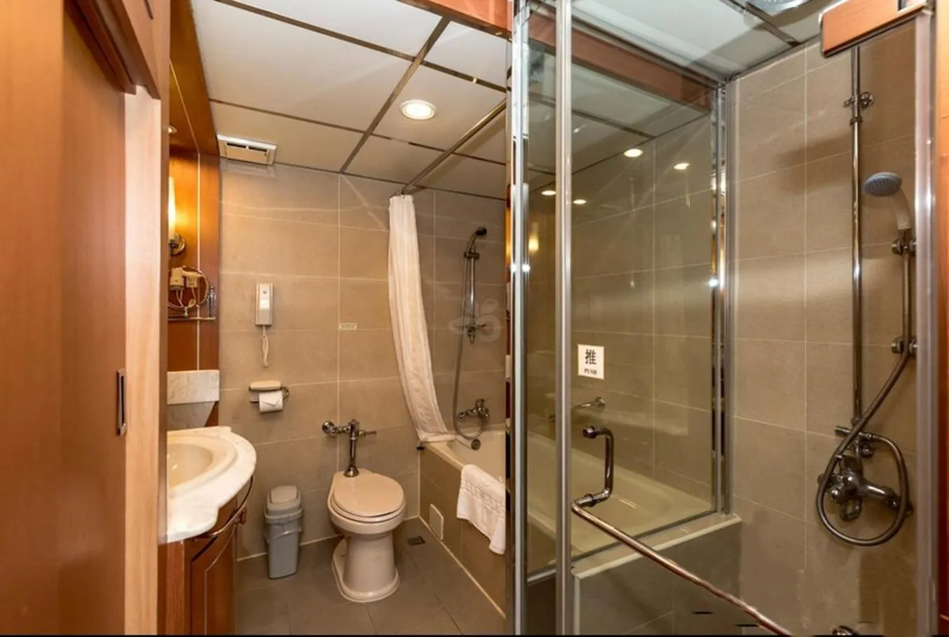 Toilet in First Hotel