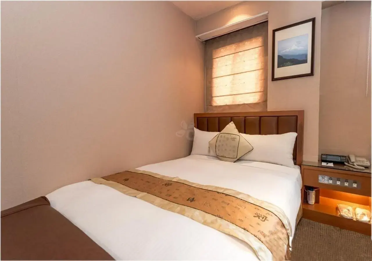 Bed in First Hotel Bed in First Hotel