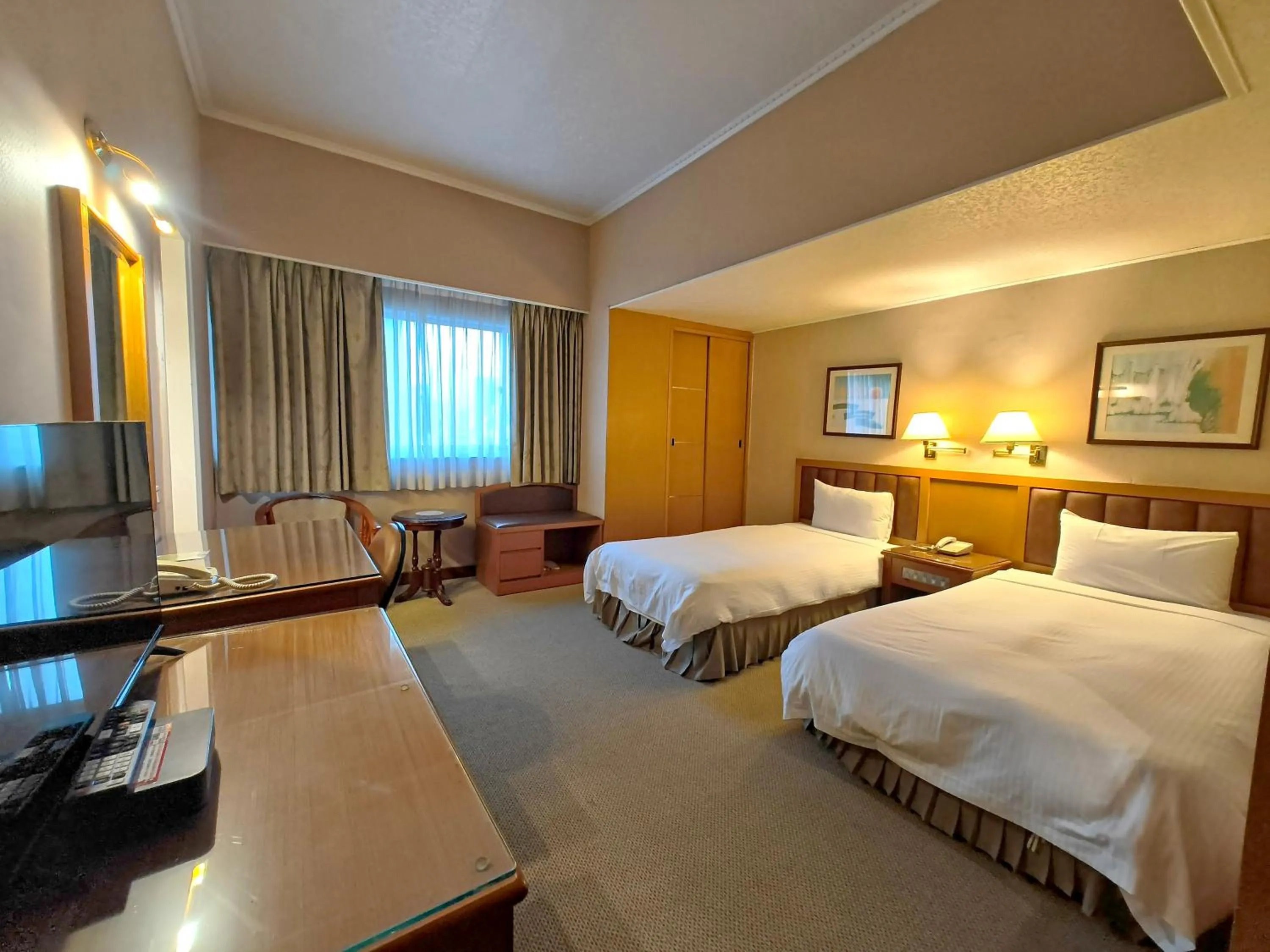 Photo of the whole room, Bed in First Hotel