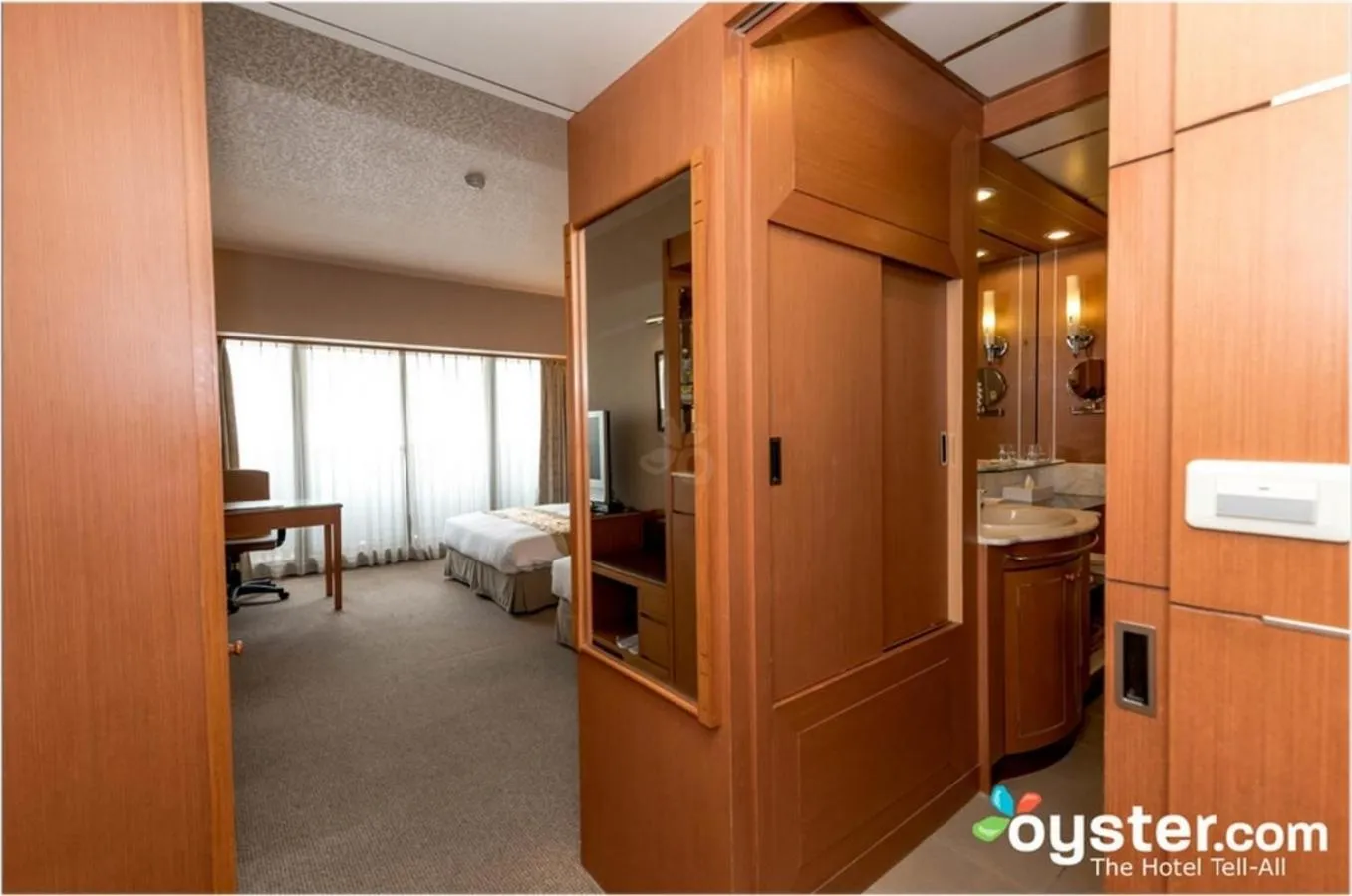 Photo of the whole room, Bed in First Hotel