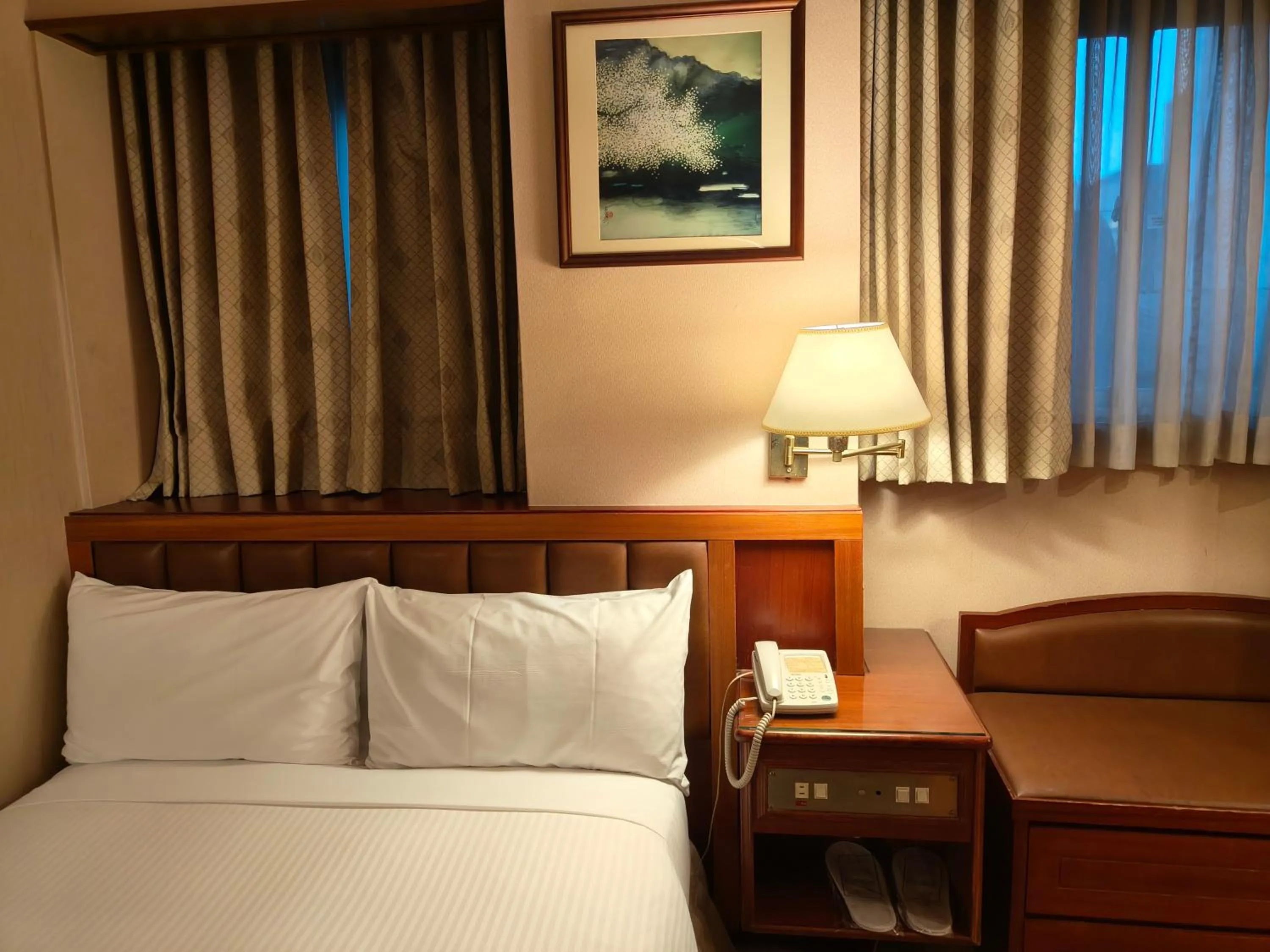 Photo of the whole room, Bed in First Hotel