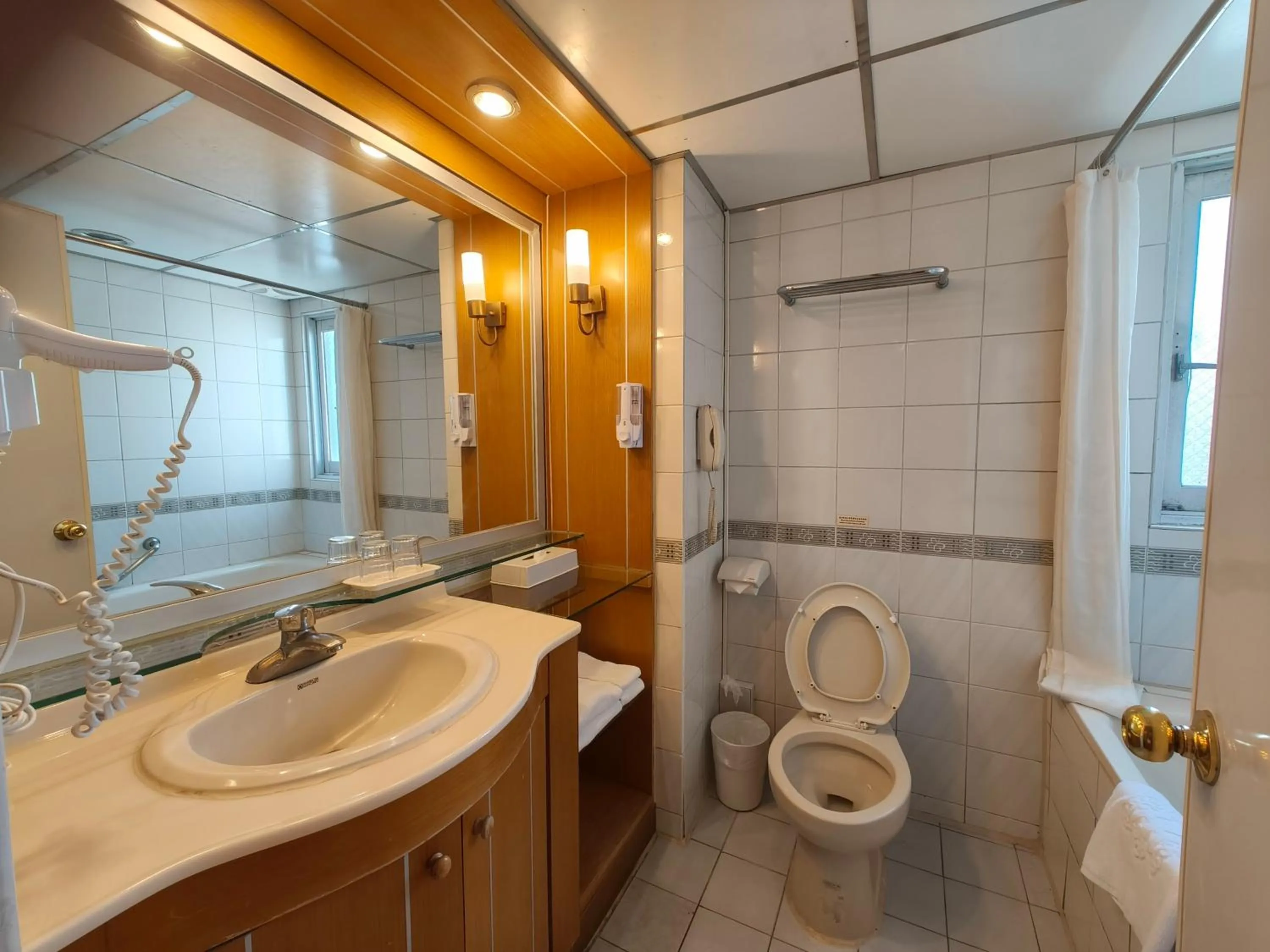 Toilet in First Hotel