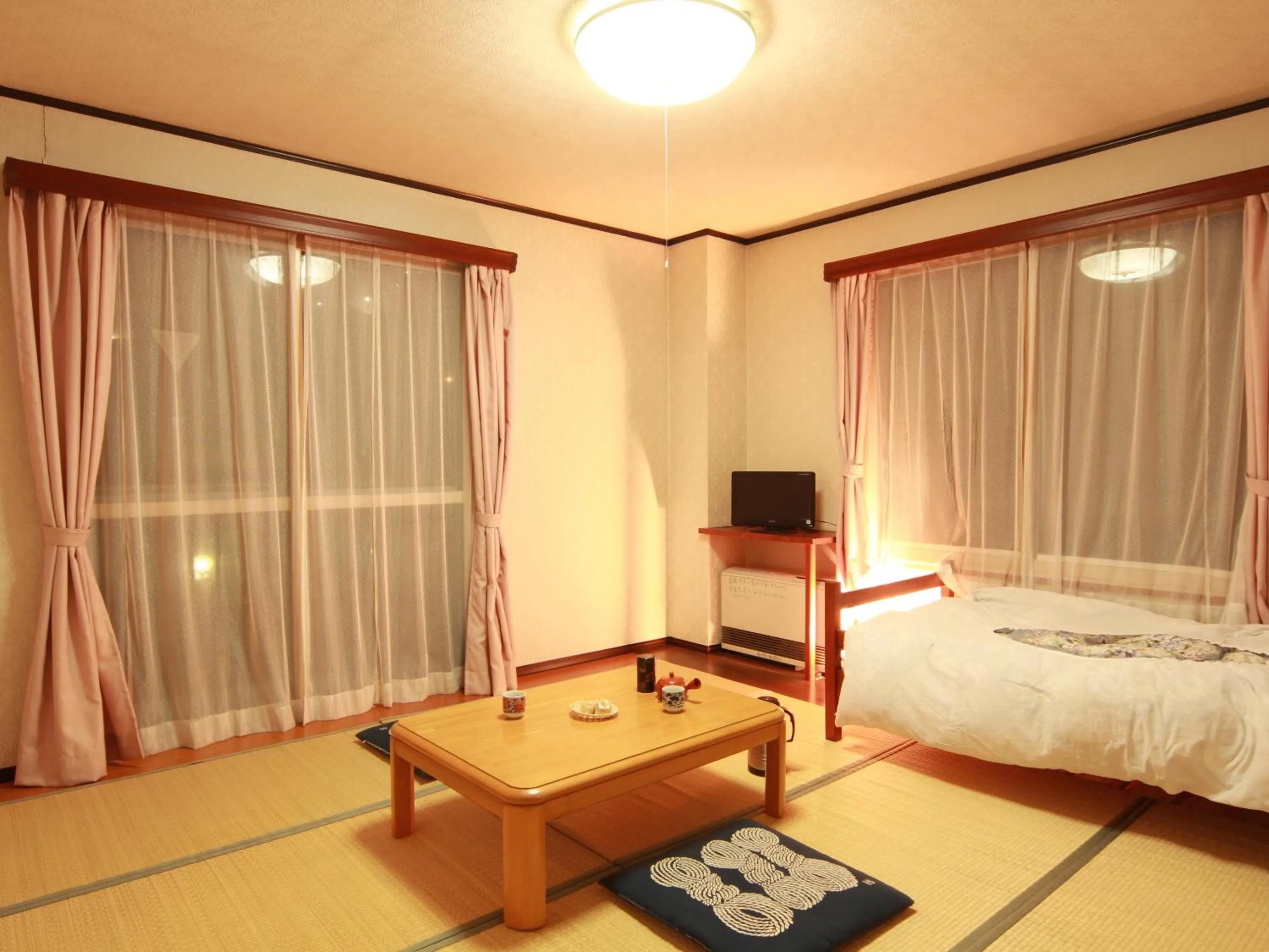 Photo of the whole room, Bed in Sunrise Meiji-ya