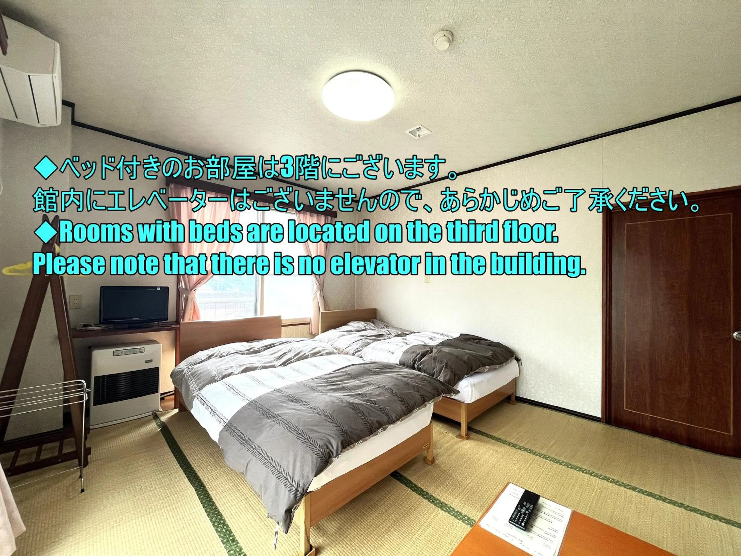 Photo of the whole room, Bed in Sunrise Meiji-ya