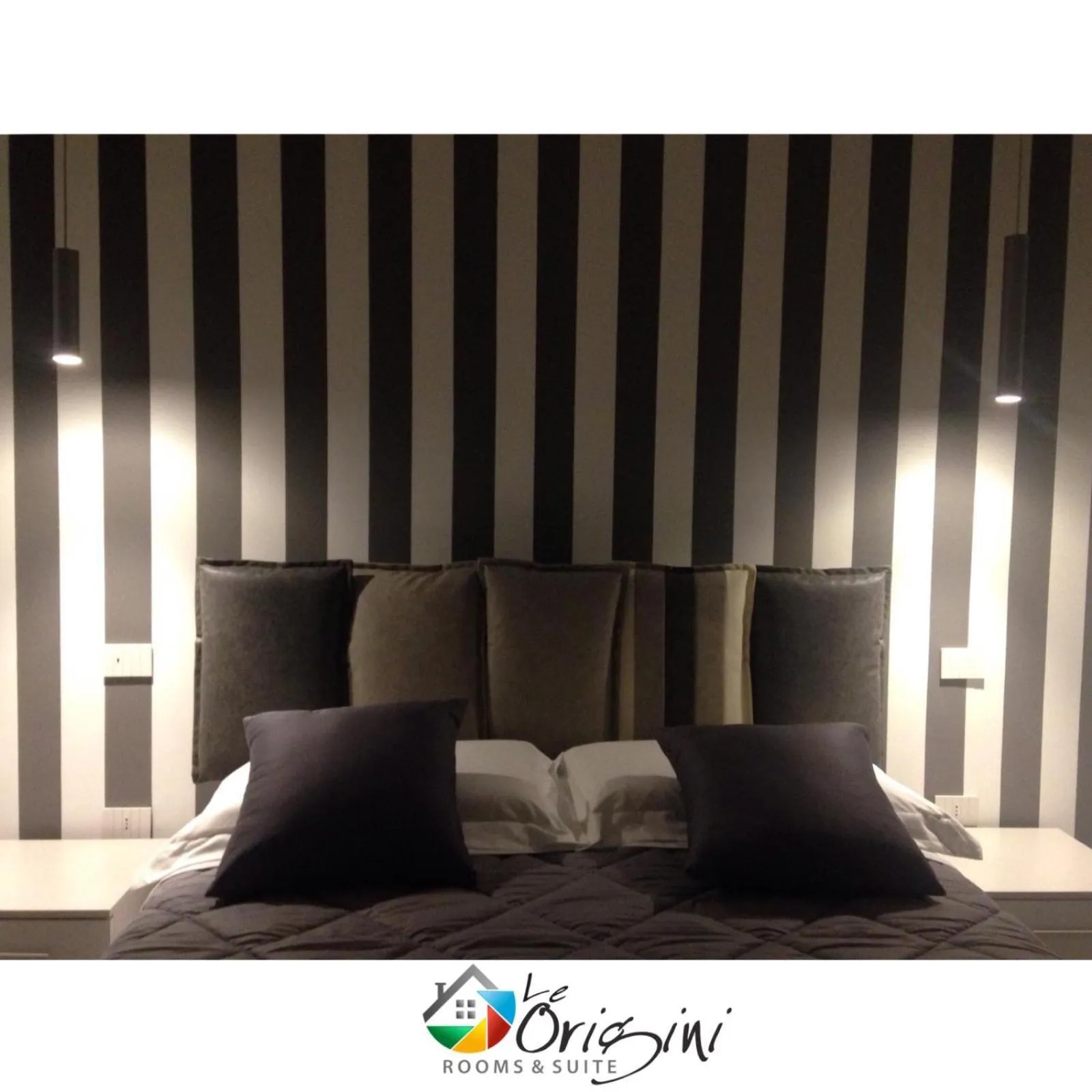 Bed in Le Origini Rooms&Suite