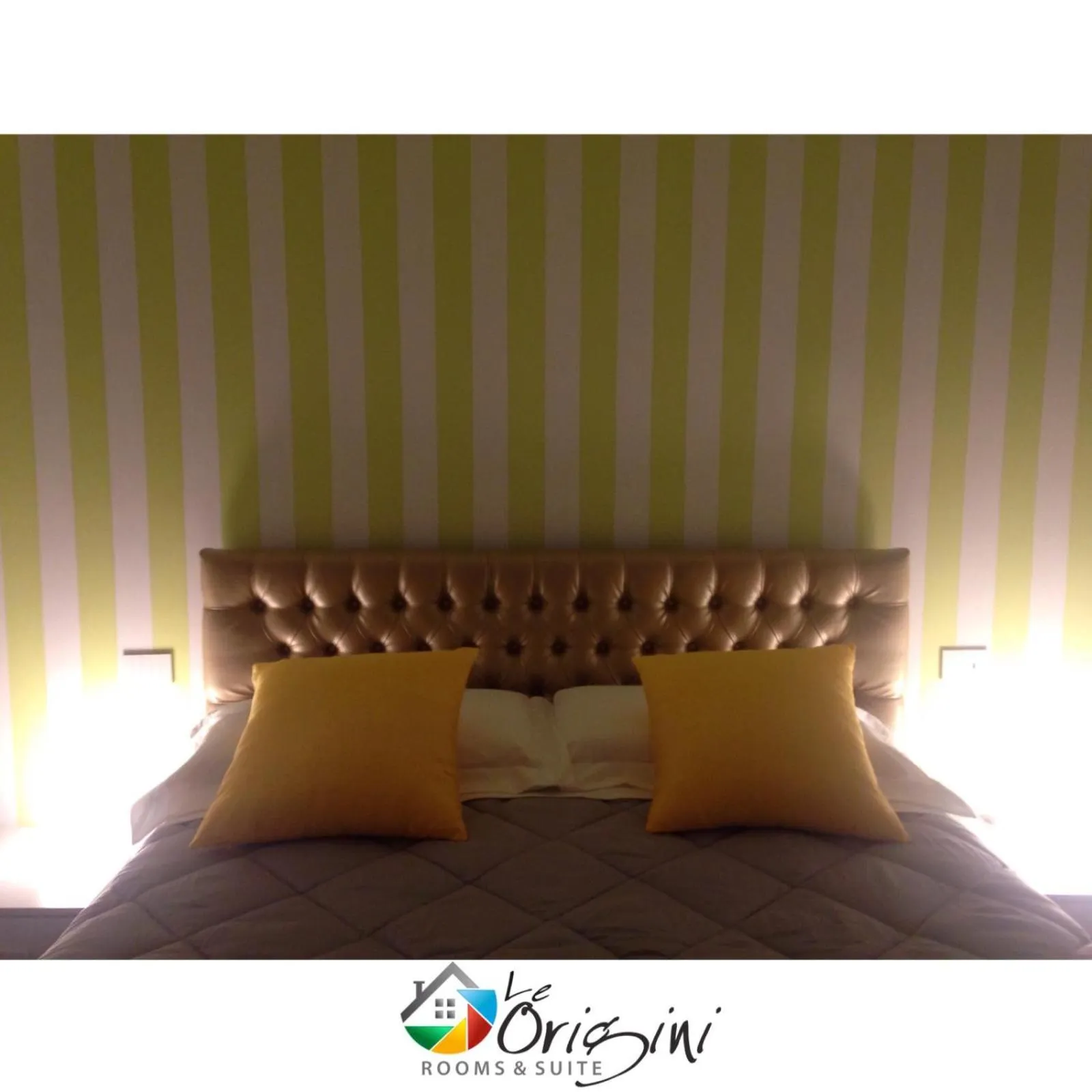 Bed in Le Origini Rooms&Suite