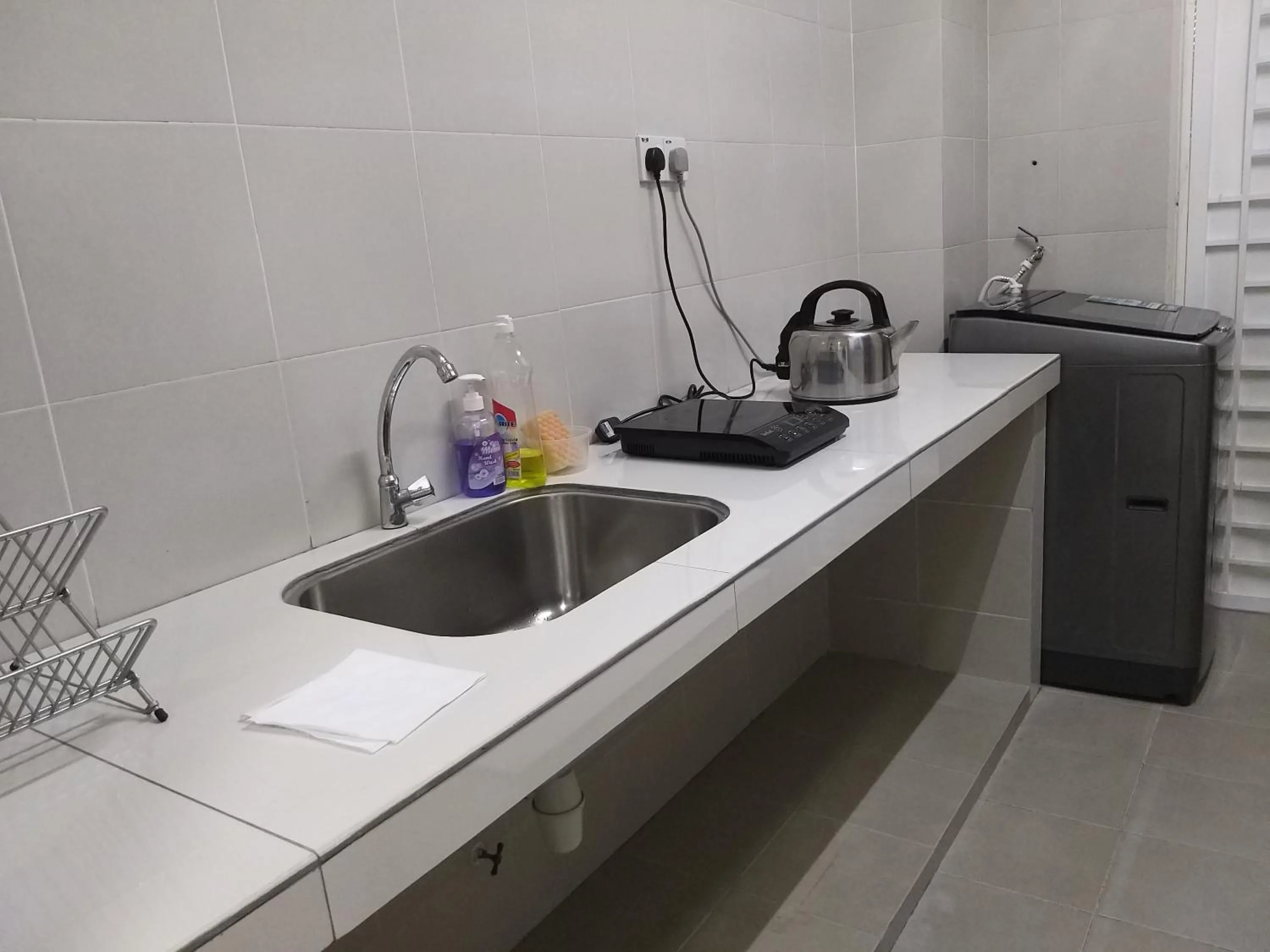 Kitchen or kitchenette in Goodview Vacation Homestay @Kajang