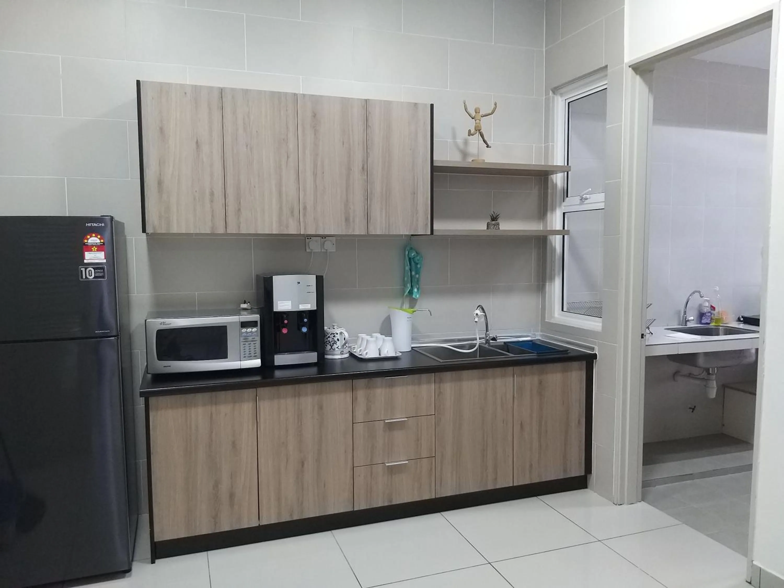 Kitchen or kitchenette in Goodview Vacation Homestay @Kajang