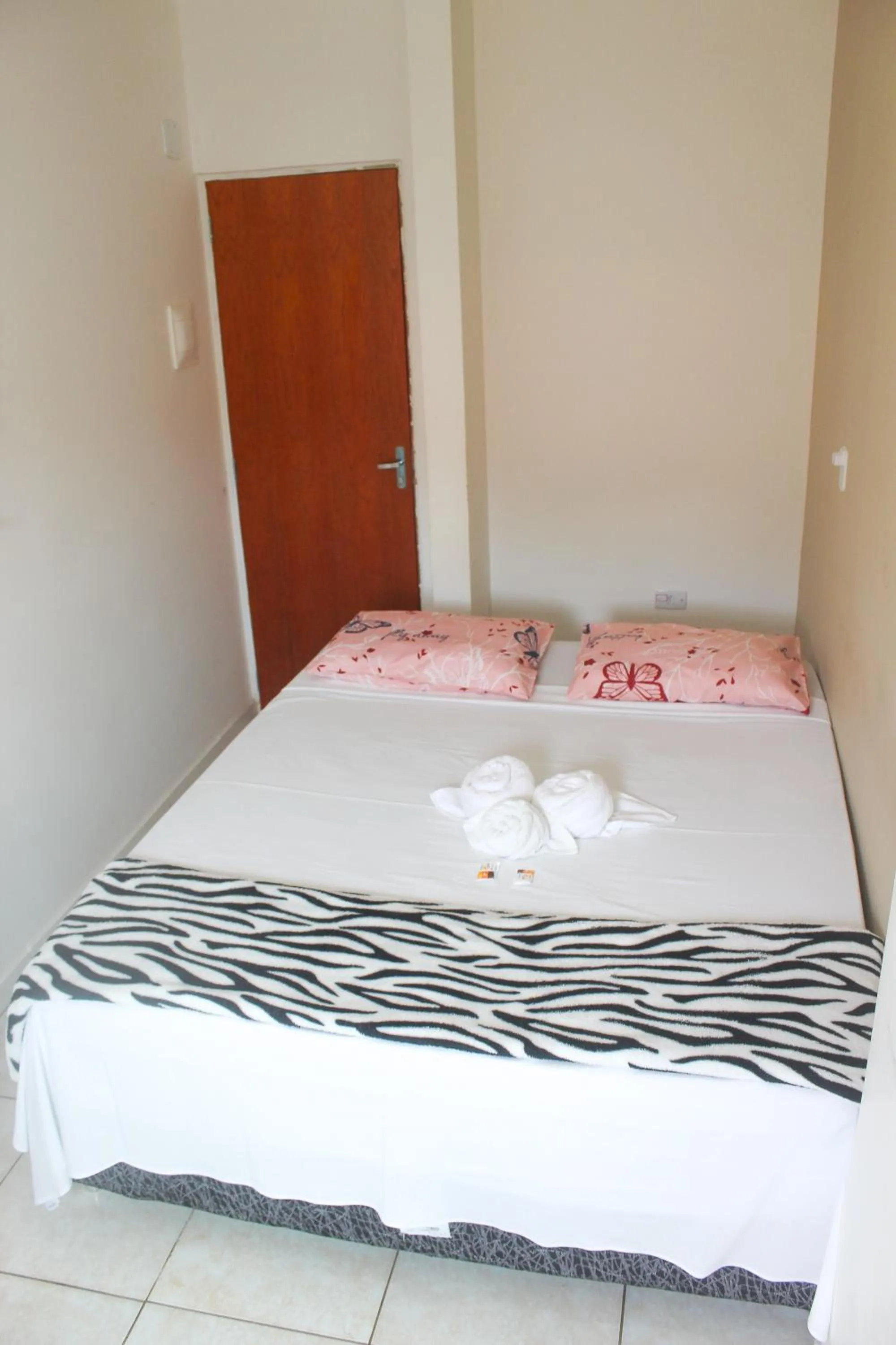 Bed in POUSADA LYRIOS do MAR
