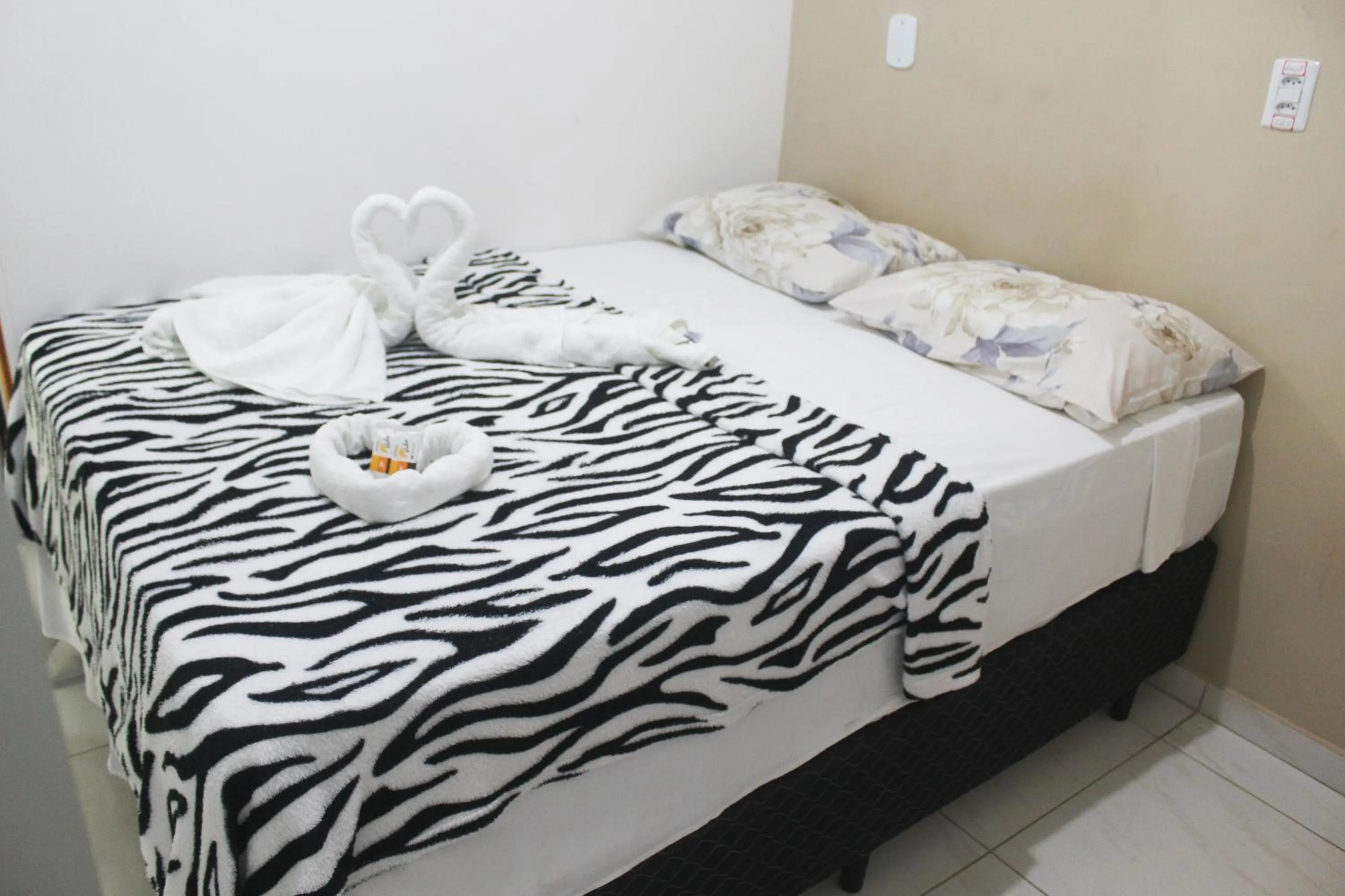 Bed in POUSADA LYRIOS do MAR