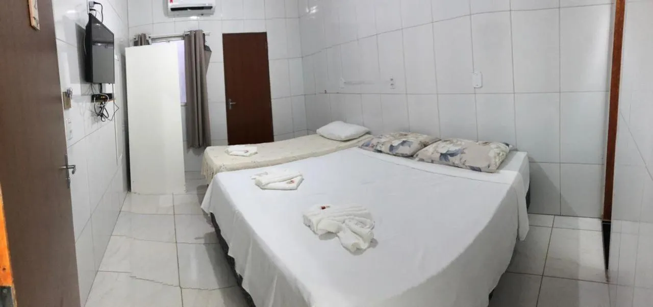 Bed in POUSADA LYRIOS do MAR