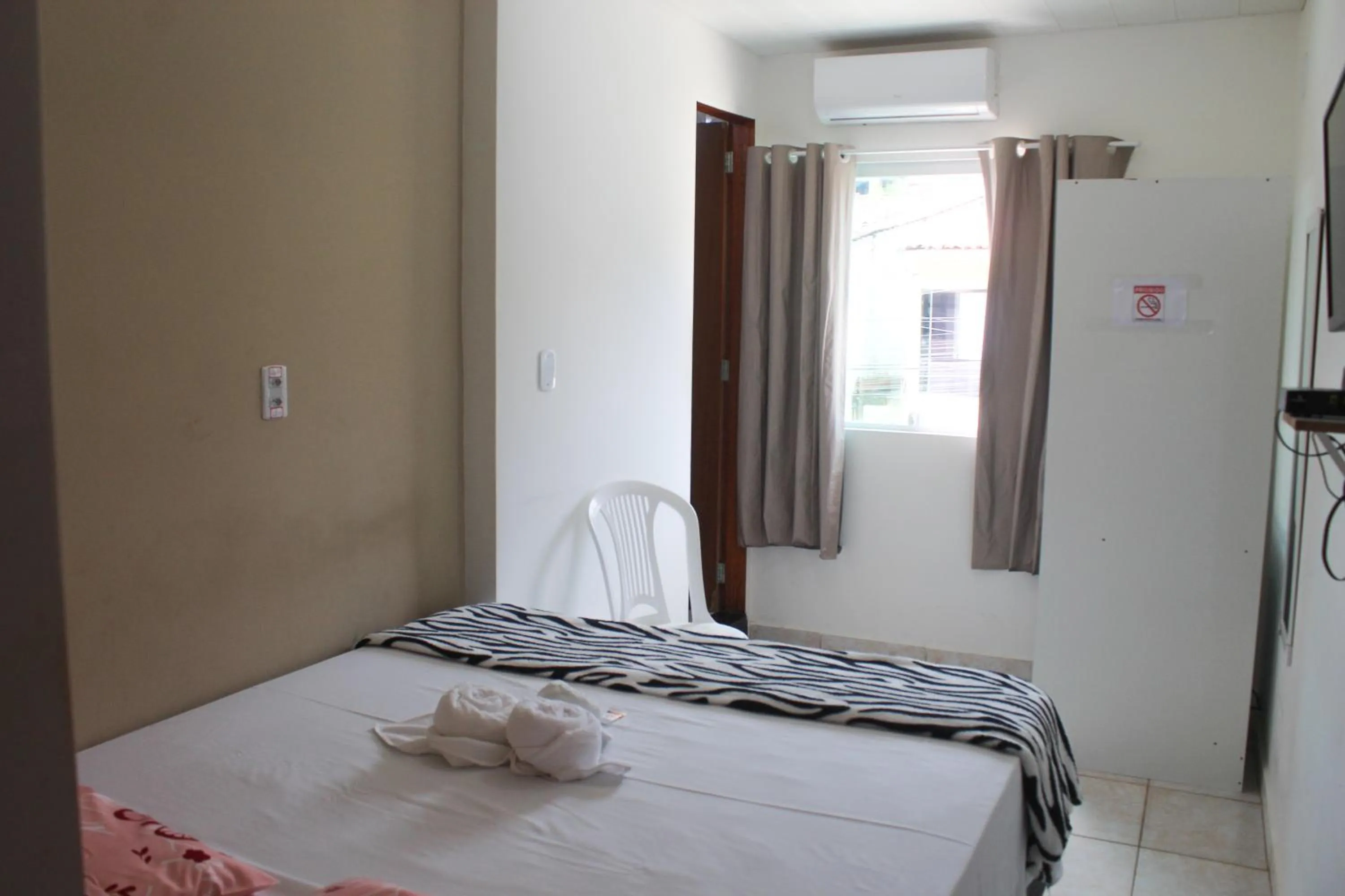 Bed in POUSADA LYRIOS do MAR