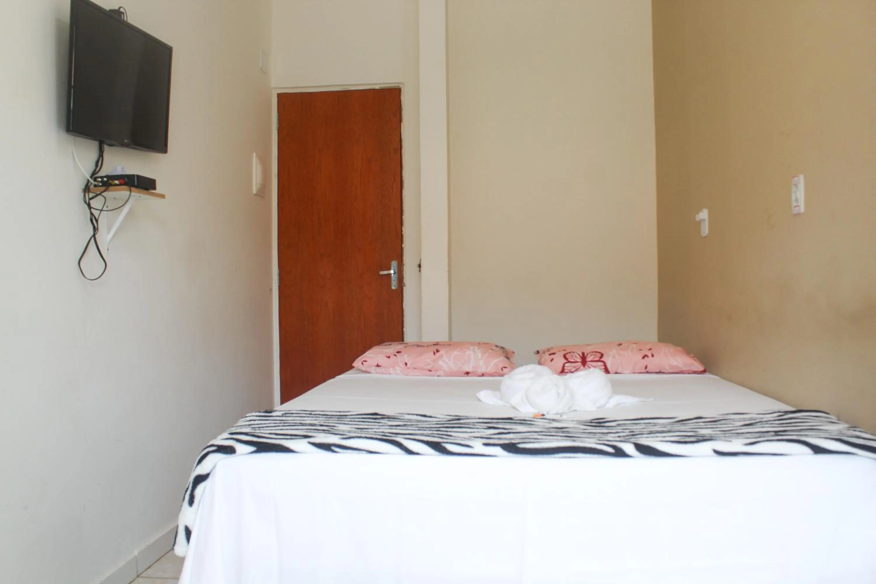 Bed in POUSADA LYRIOS do MAR