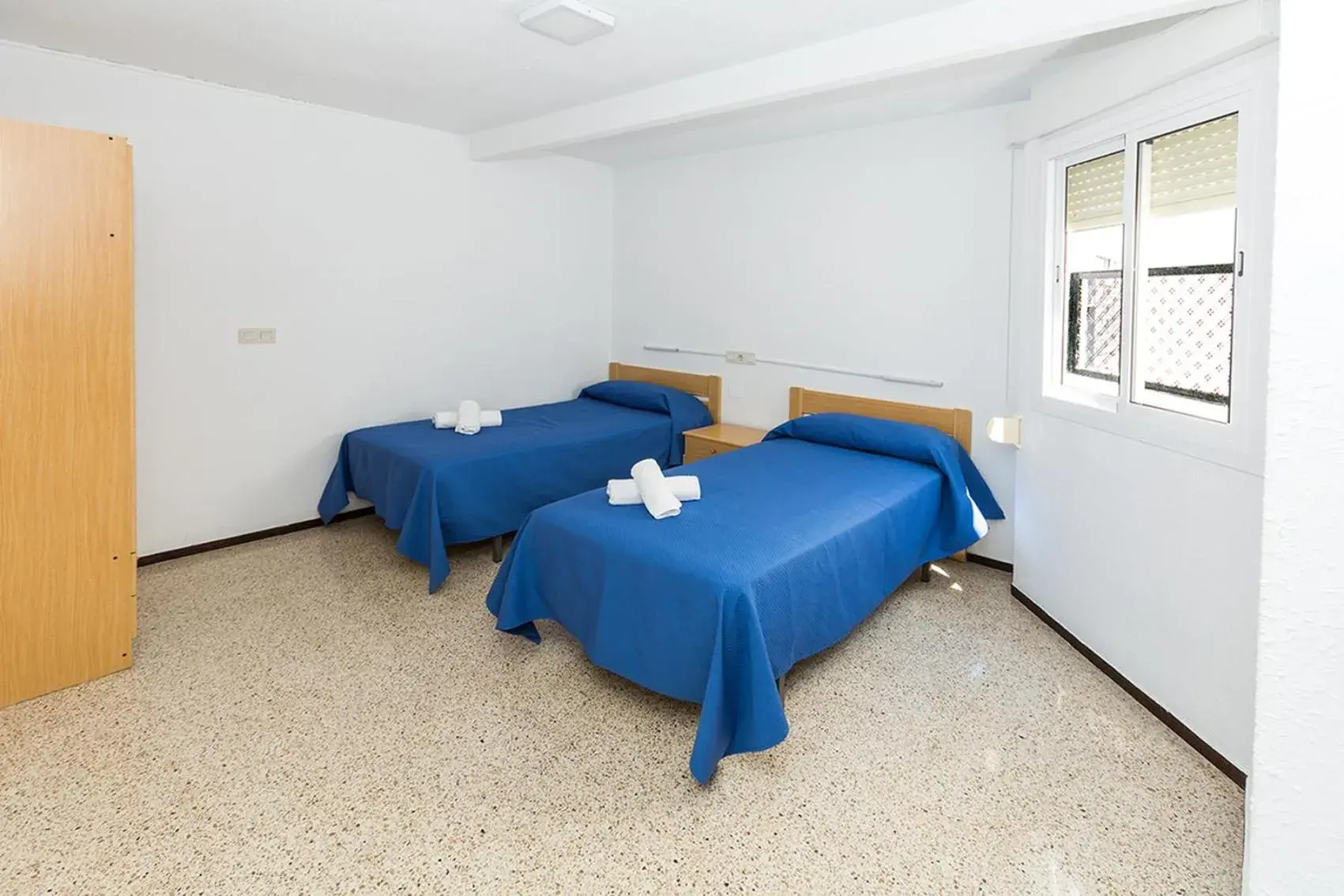 Bed in Hostal El Mercat Bed in Hostal El Mercat