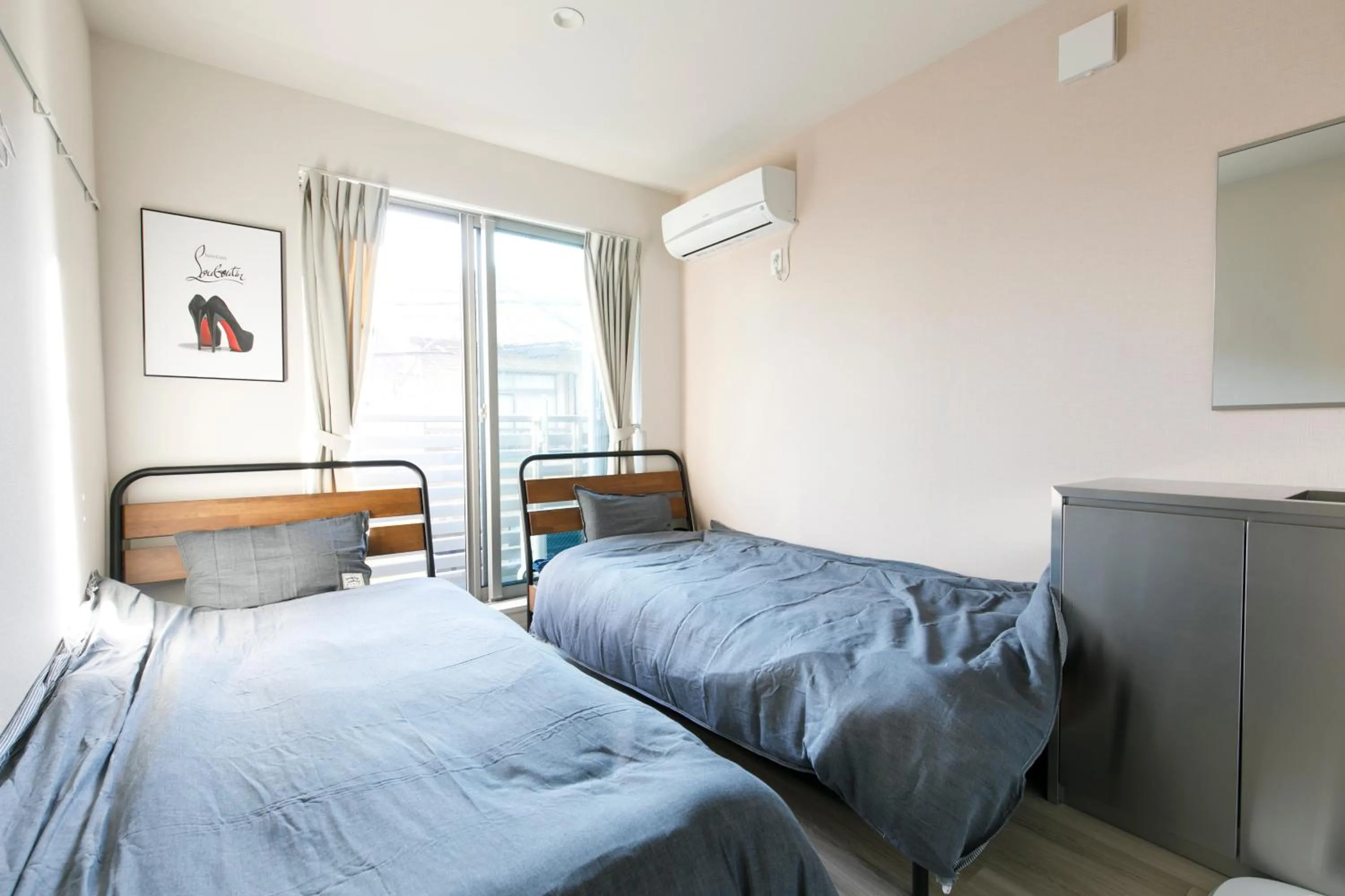 Bed in TENGACHAYA INN