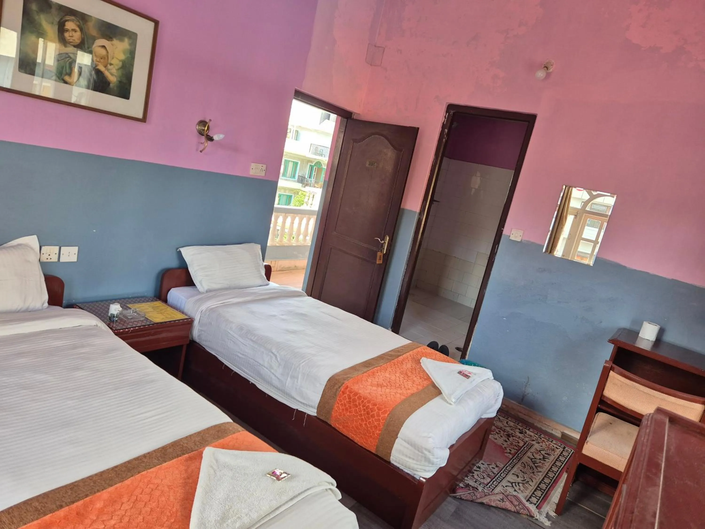 Bed in Hotel Fishtail Villa