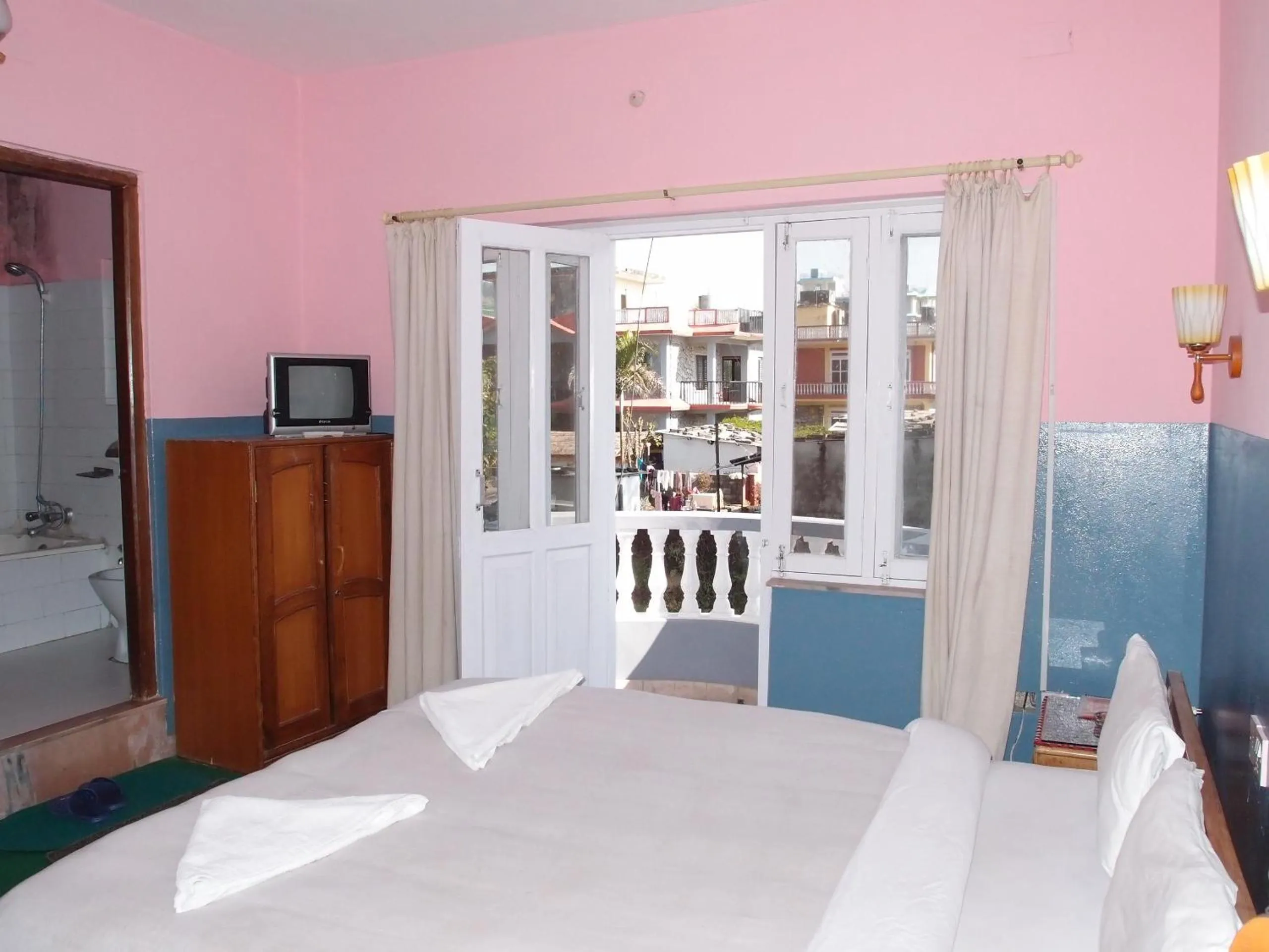 Bed in Hotel Fishtail Villa