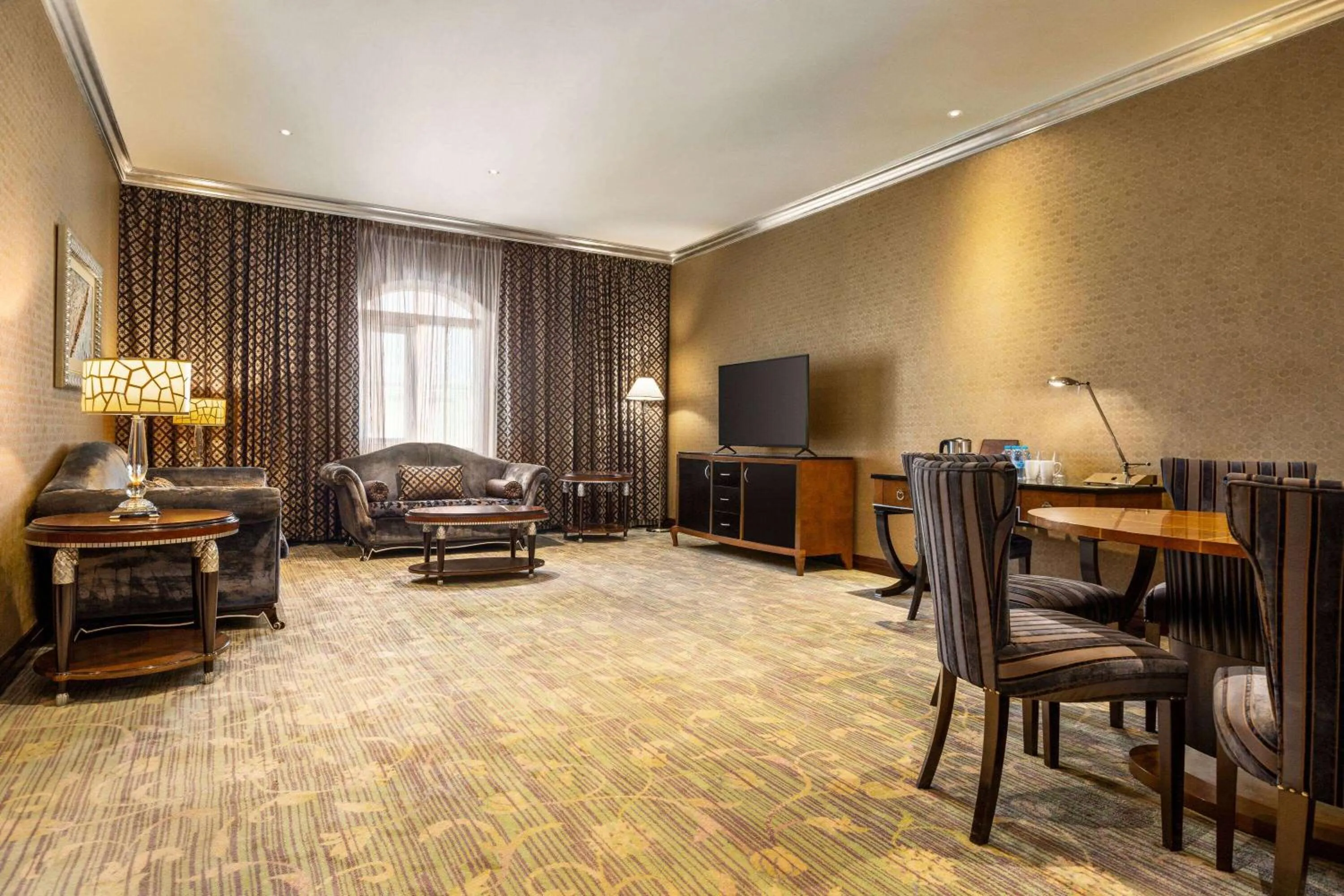 Photo of the whole room in Grand Regency Doha, Trademark Collection by Wyndham