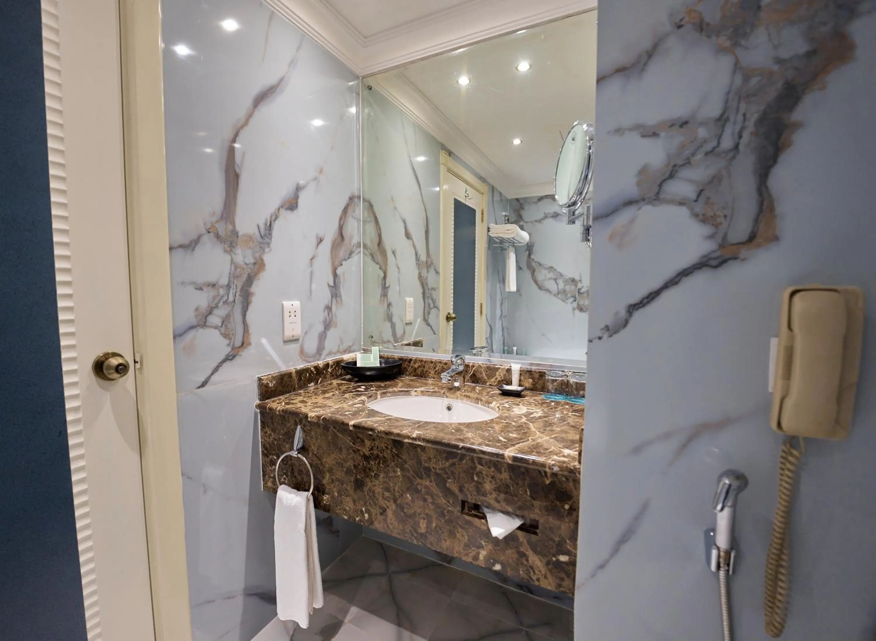 Bathroom in Grand Regency Doha, Trademark Collection by Wyndham