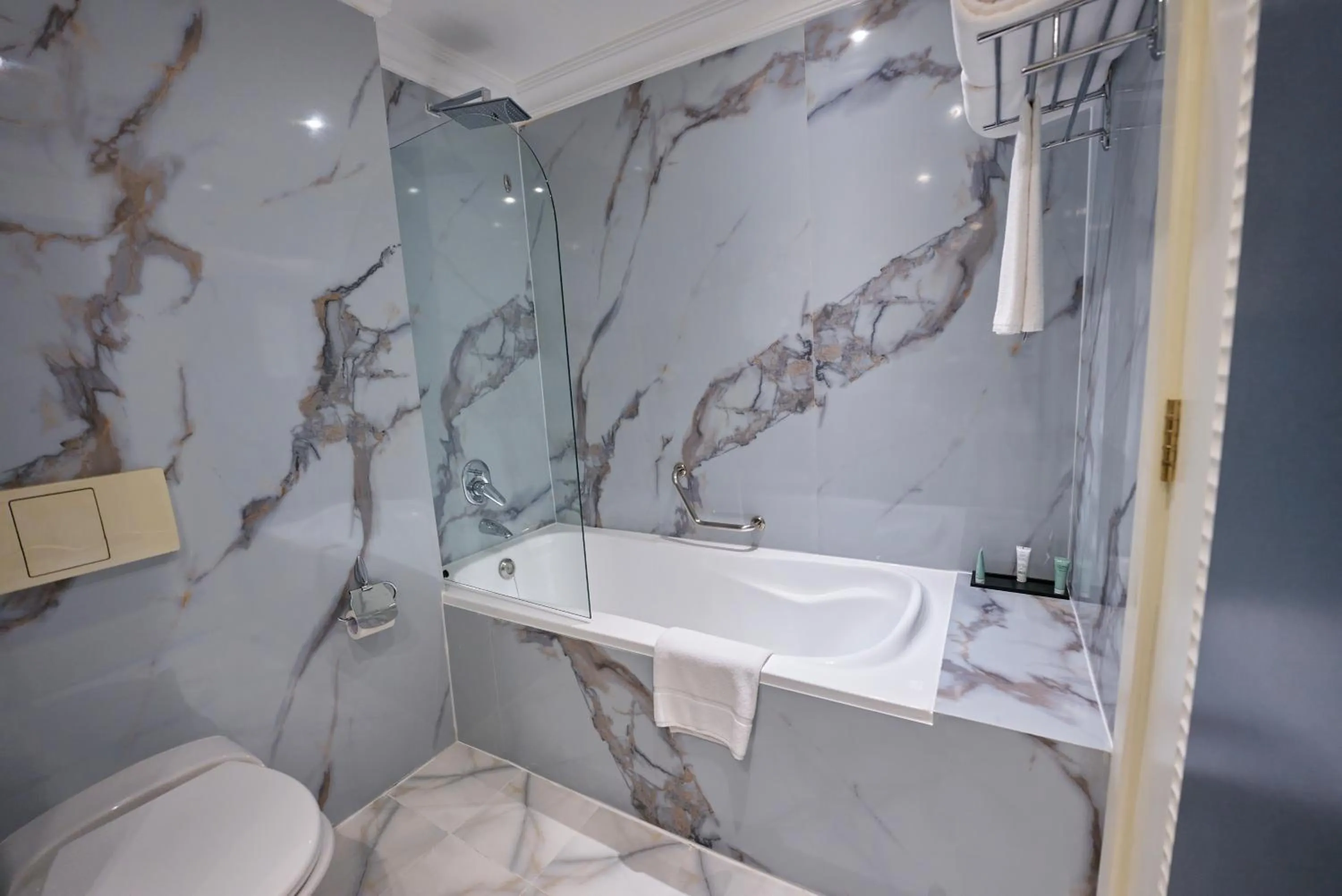 Bathroom in Grand Regency Doha, Trademark Collection by Wyndham