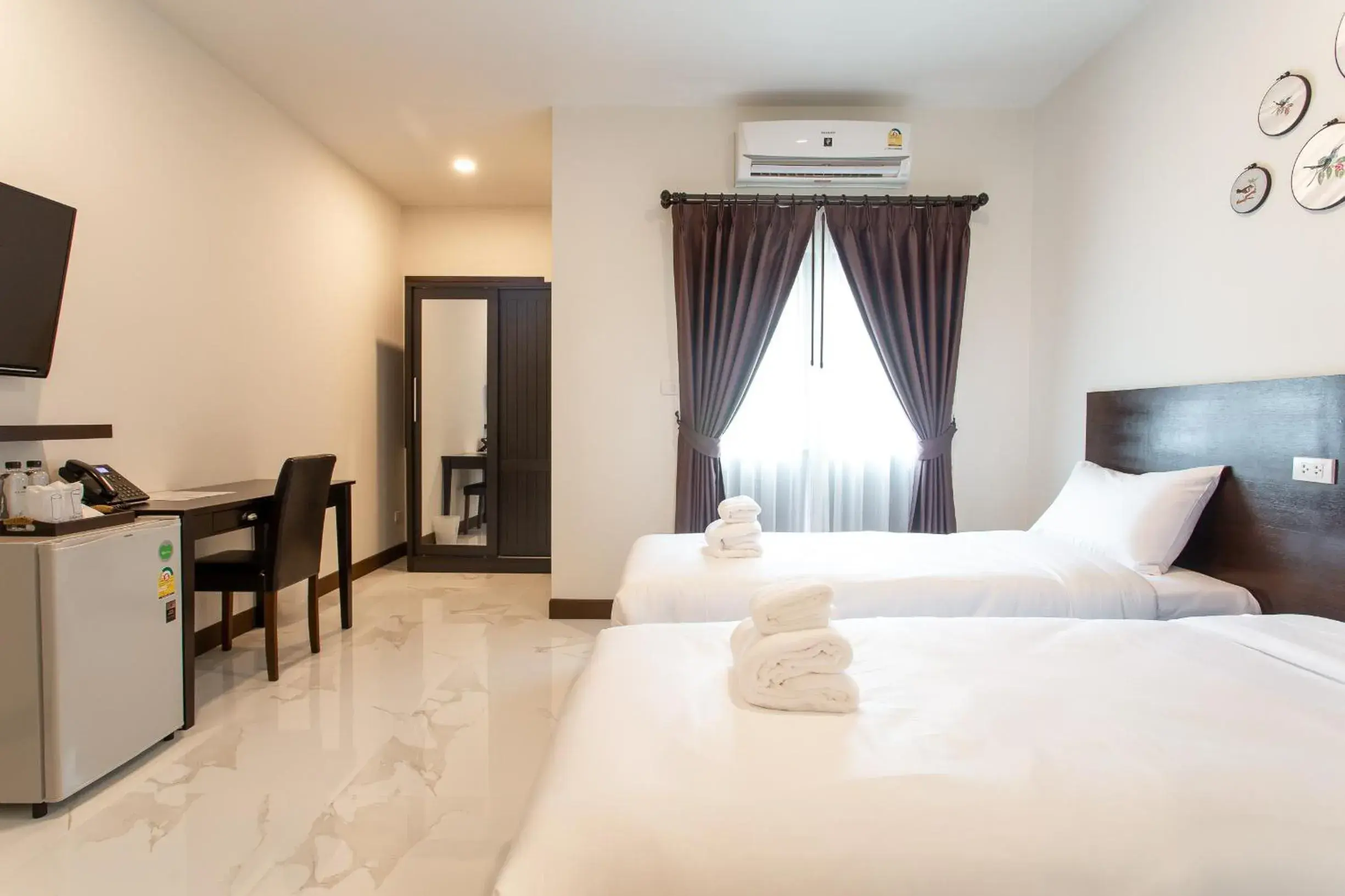 Bed in Khampare Chiang Mai Hotel Bed in Khampare Chiang Mai Hotel