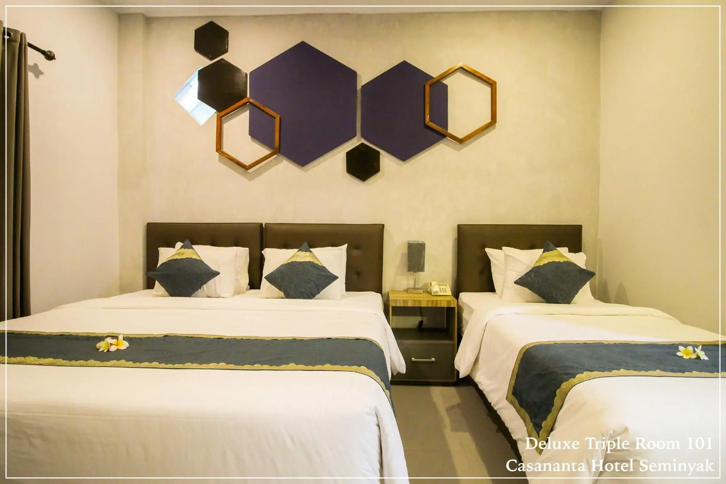 Deluxe Triple Room - single occupancy in Casananta Seminyak Deluxe Triple Room - single occupancy in Casananta Seminyak