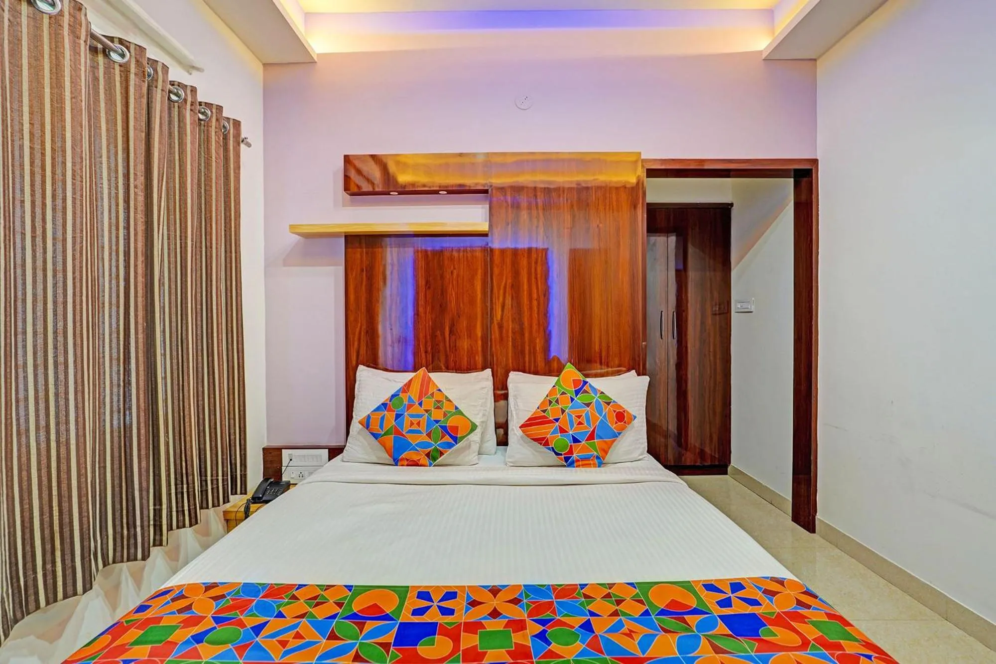 Bed in FabHotel Royal Blue Meridian Inn