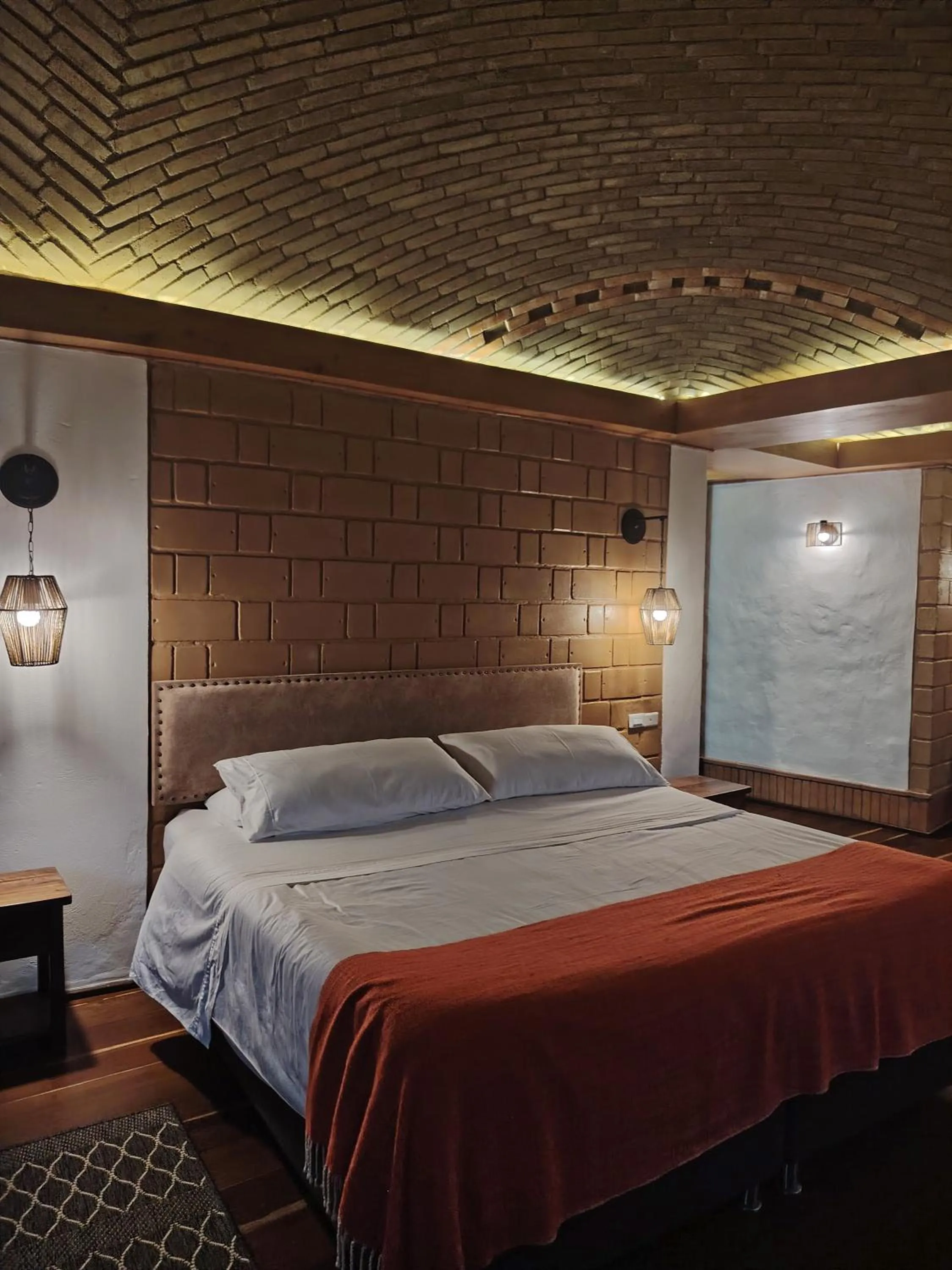 Bed in La Alhambra Hotel Boutique