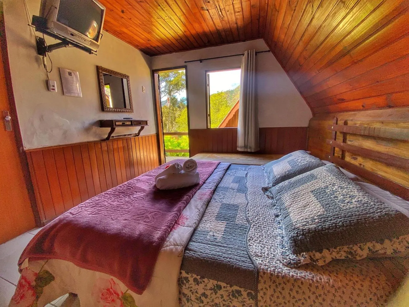 Bed in Pousada Colibri Serrano