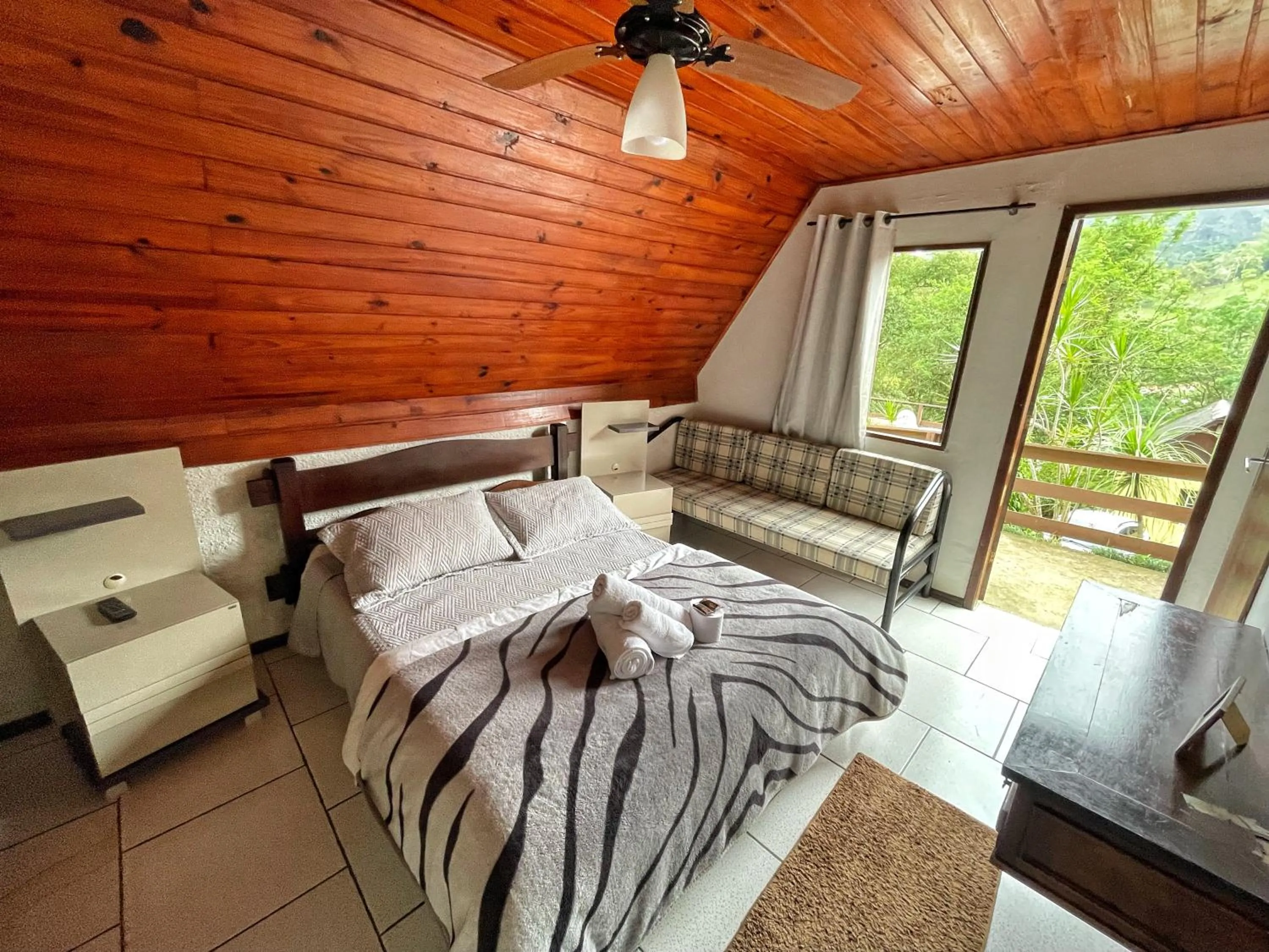 Bed in Pousada Colibri Serrano