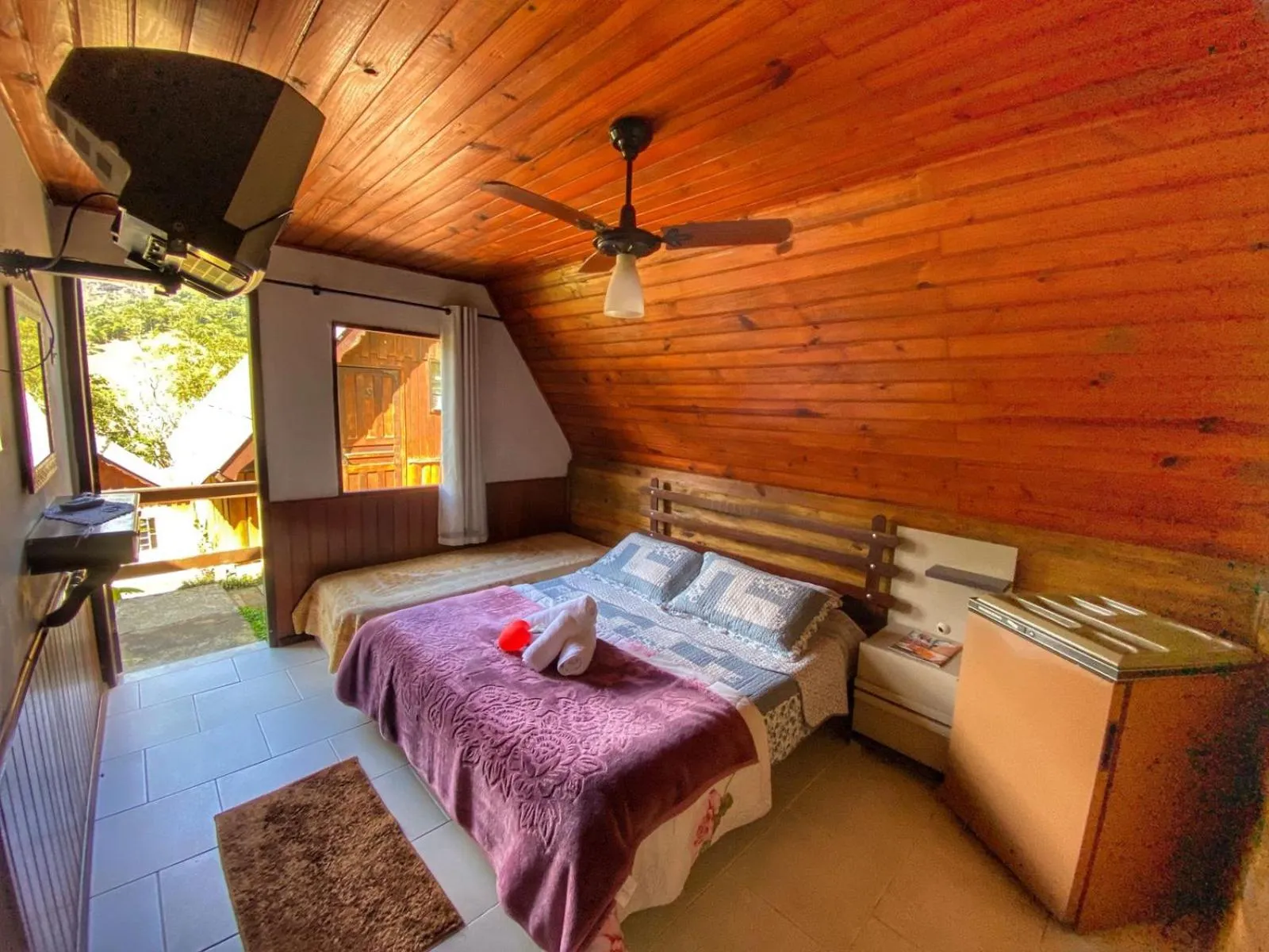 Bed in Pousada Colibri Serrano