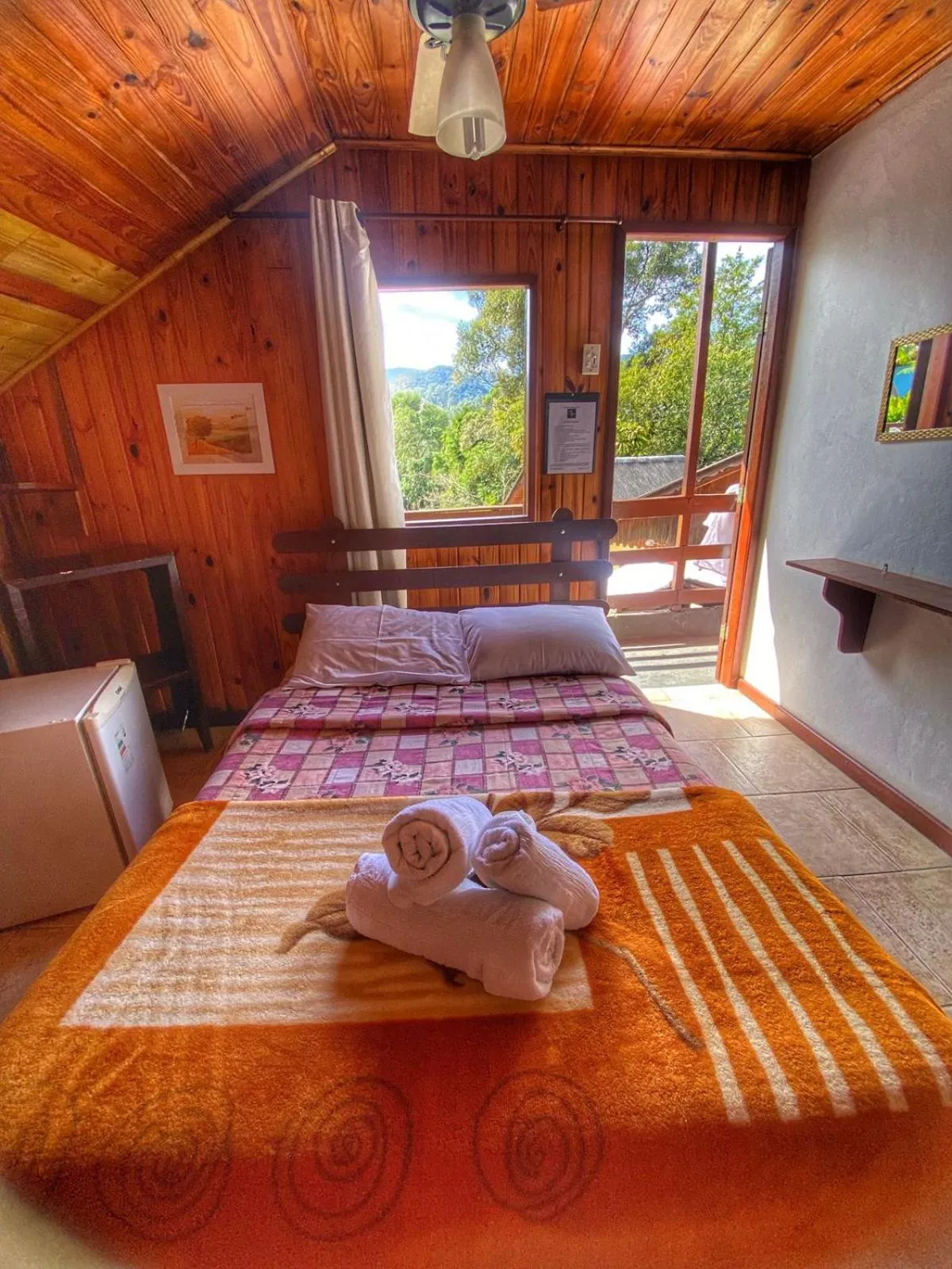 Bed in Pousada Colibri Serrano