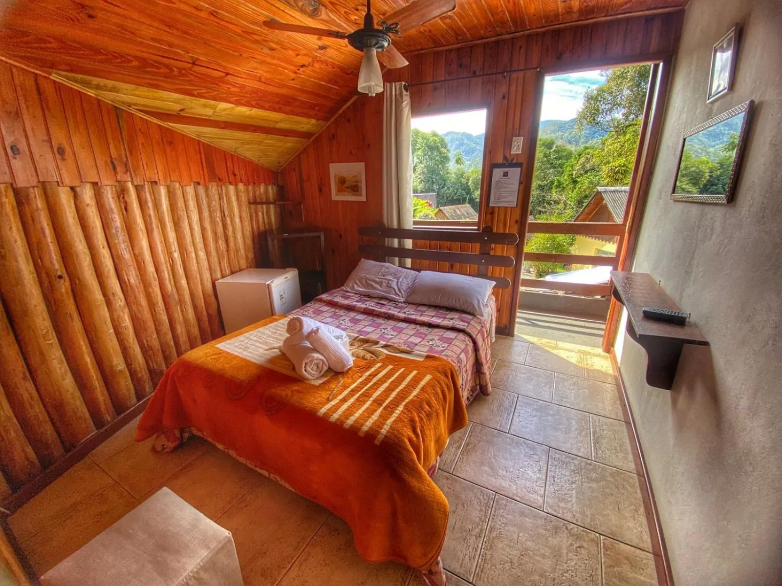 Bed in Pousada Colibri Serrano