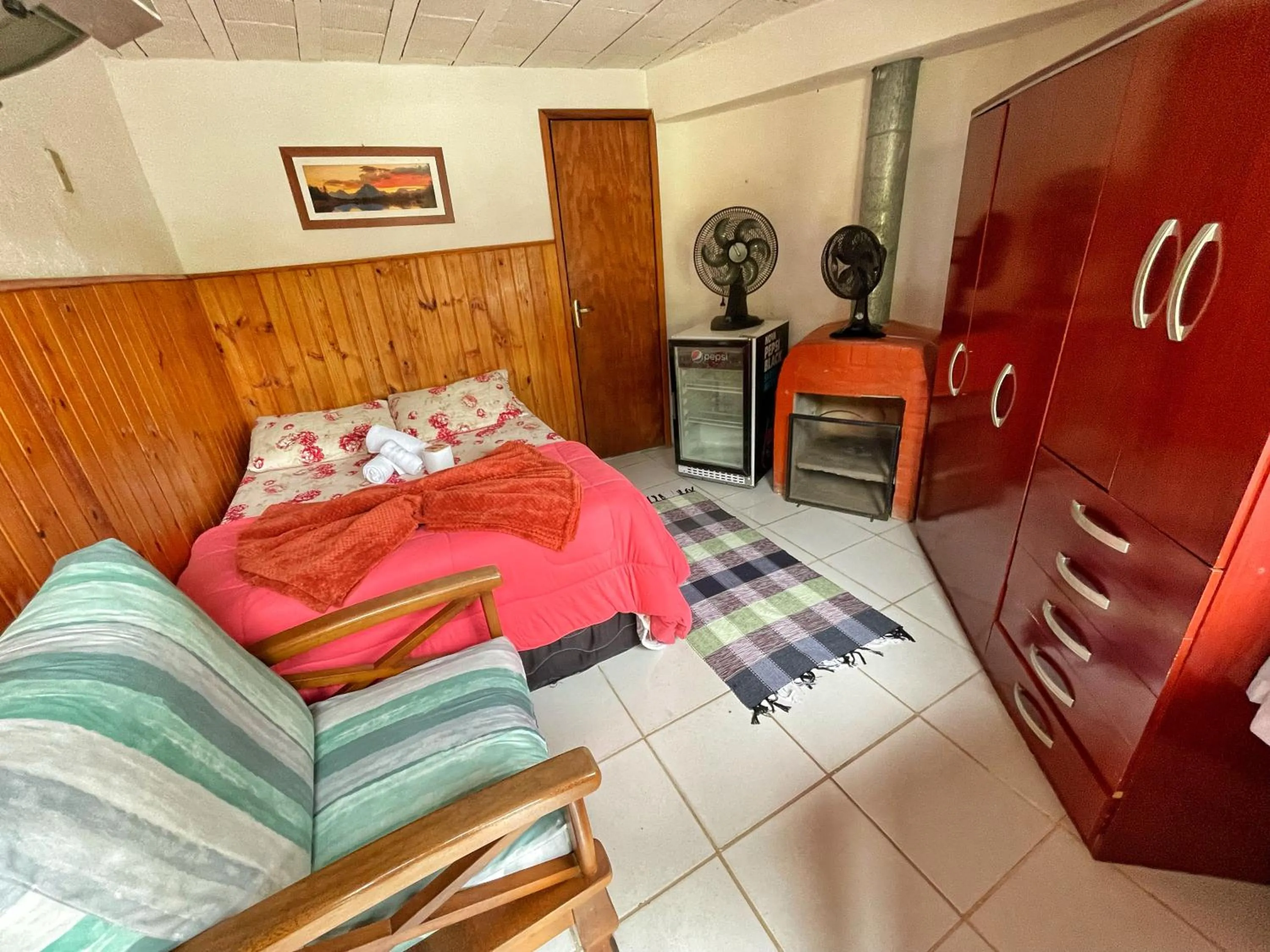 Bed in Pousada Colibri Serrano