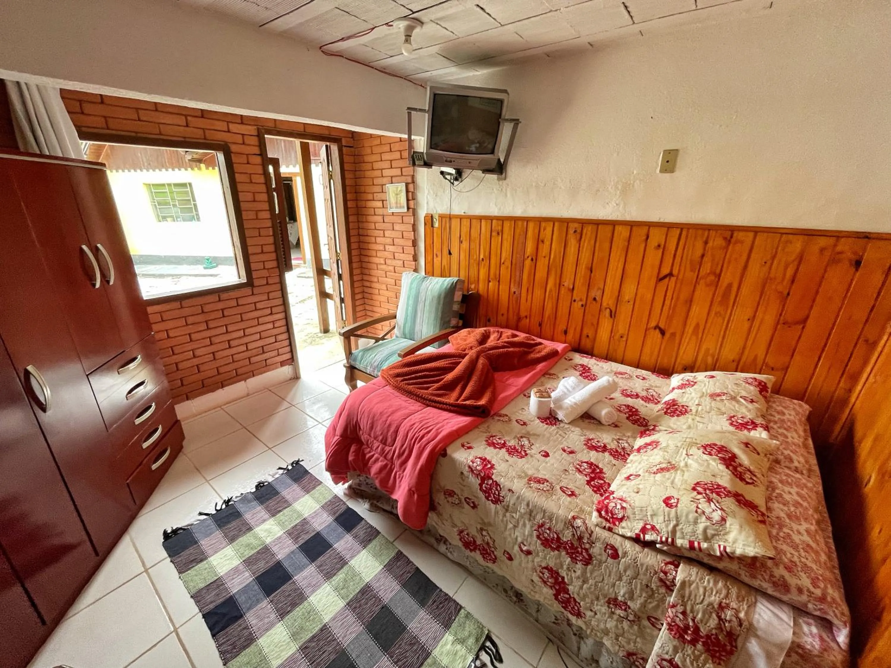 Bed in Pousada Colibri Serrano