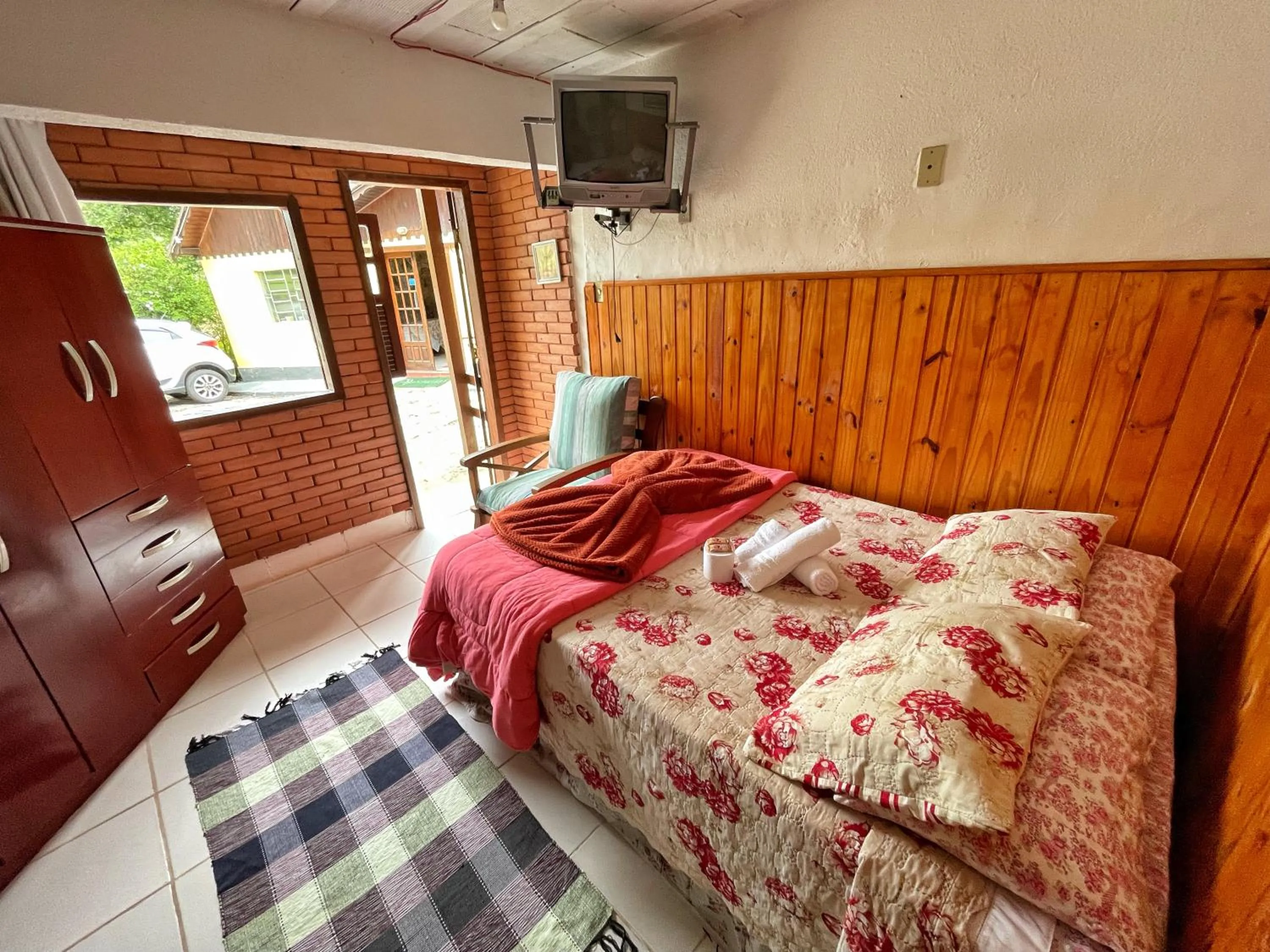 Bed in Pousada Colibri Serrano