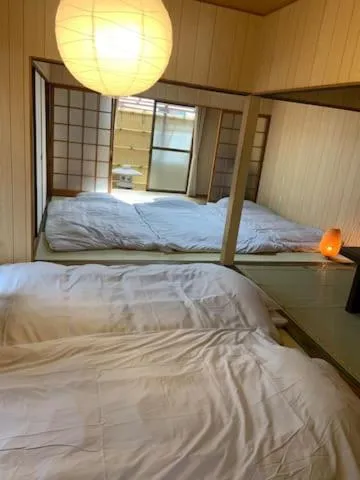Bed in Kyoto Osaka SUMIREYA