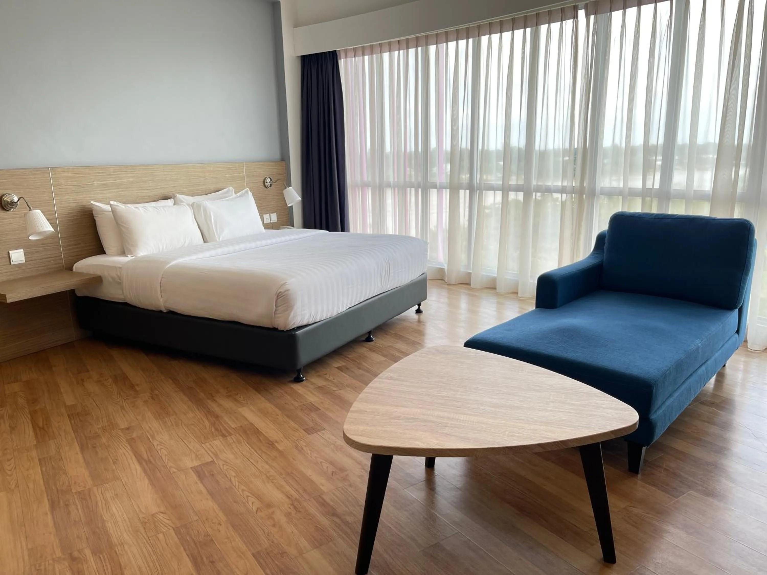 Photo of the whole room, Bed in Win Hotel